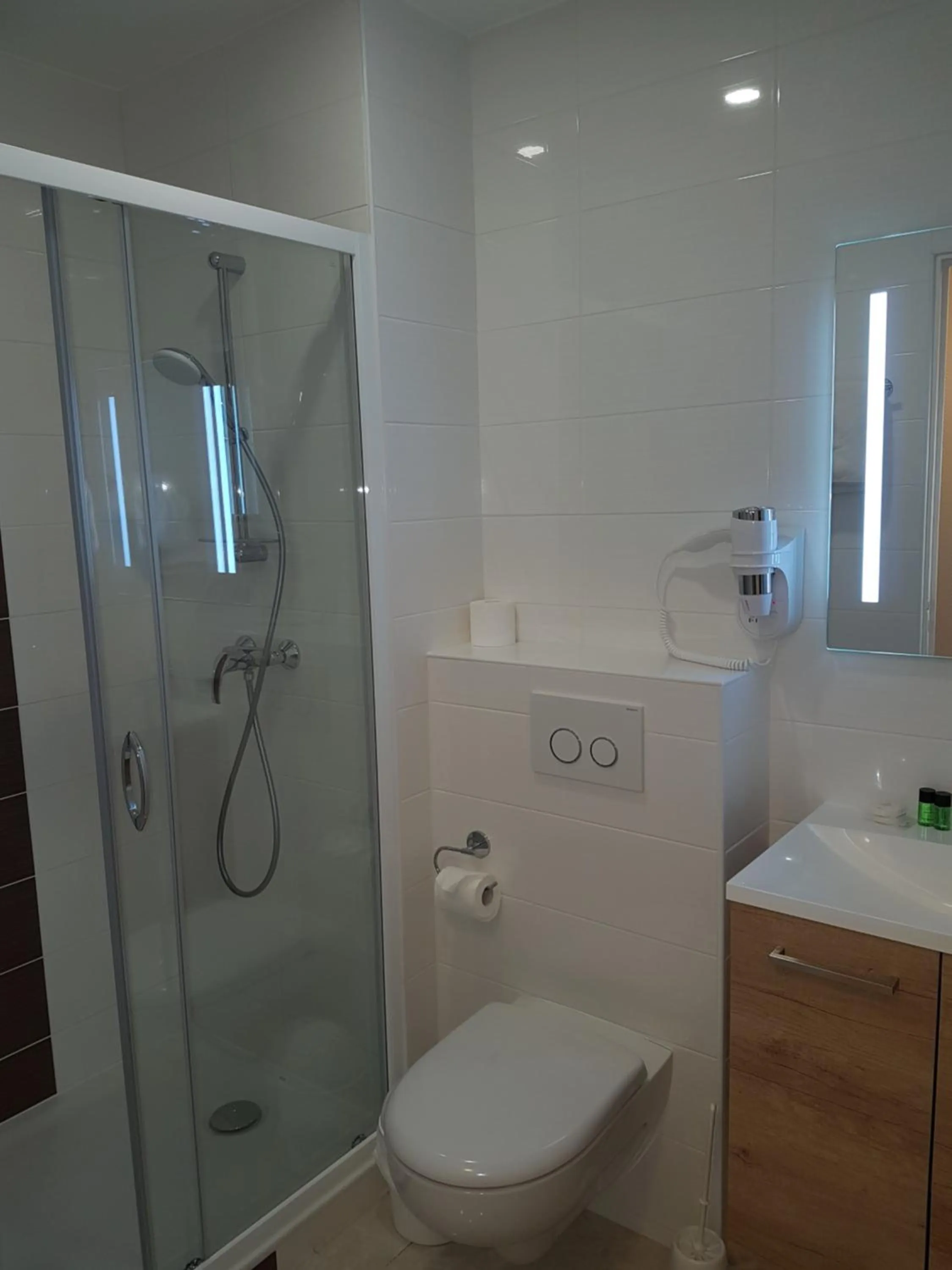 Bathroom in Hôtel du Cheval Rouge