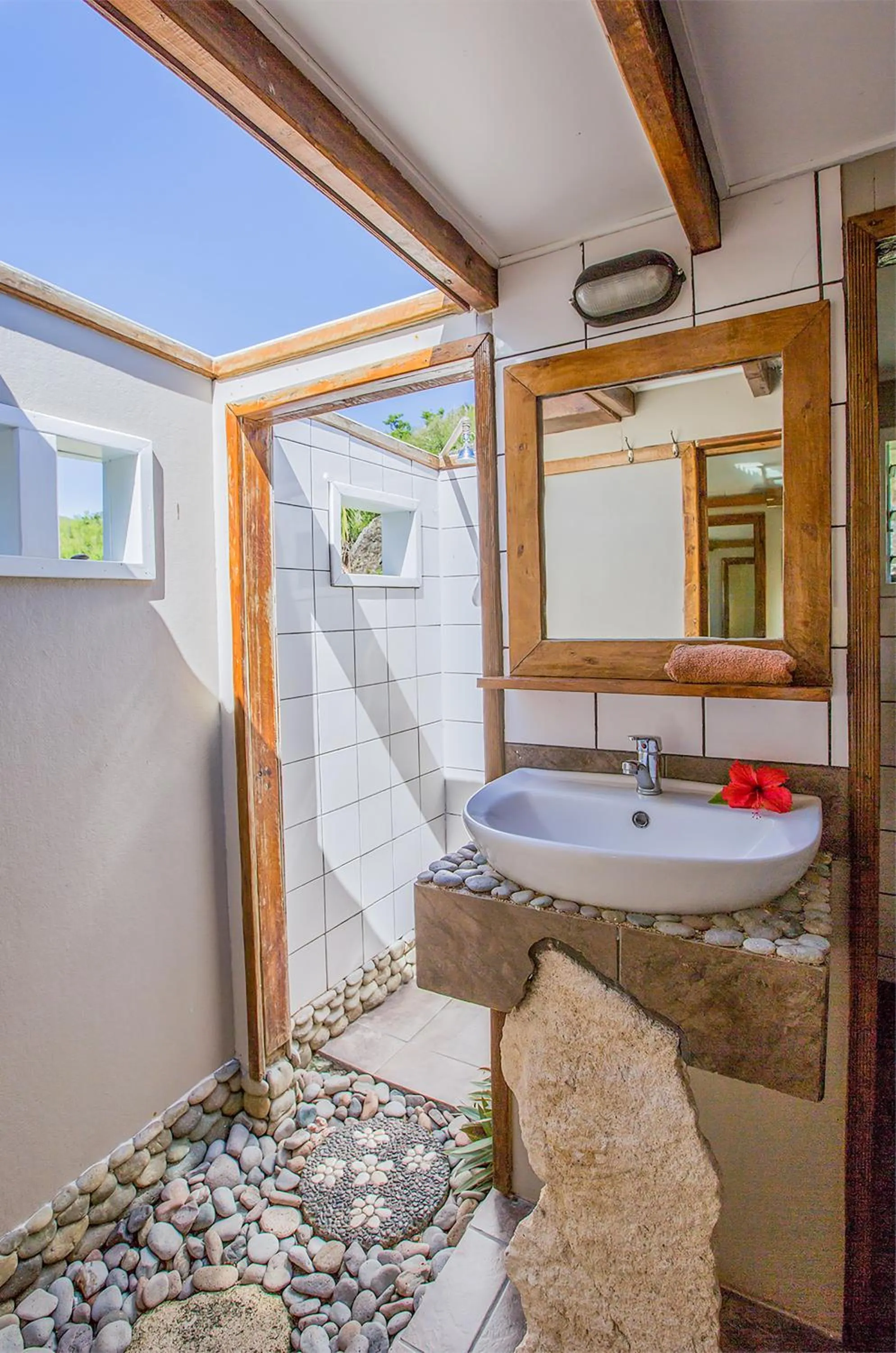 Bathroom in Barefoot Kuata Island Resort