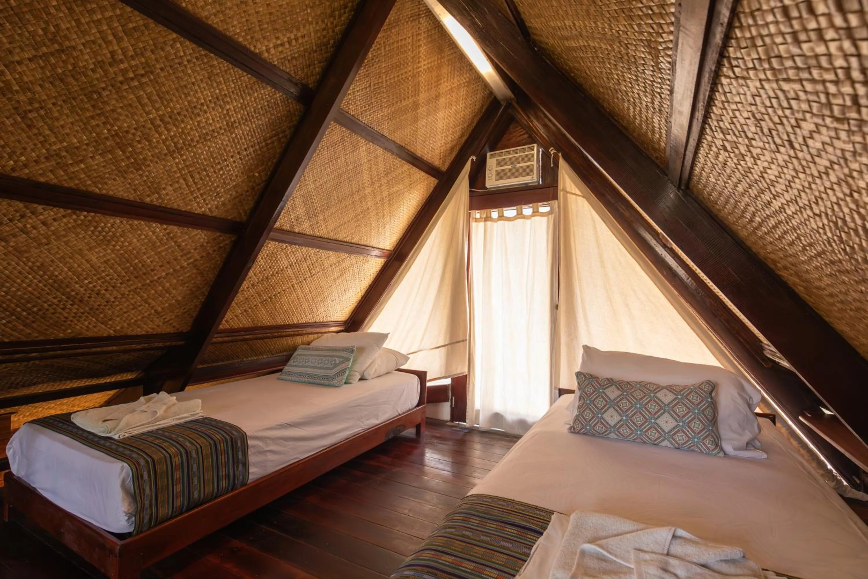 Bed in Harana Surf Resort