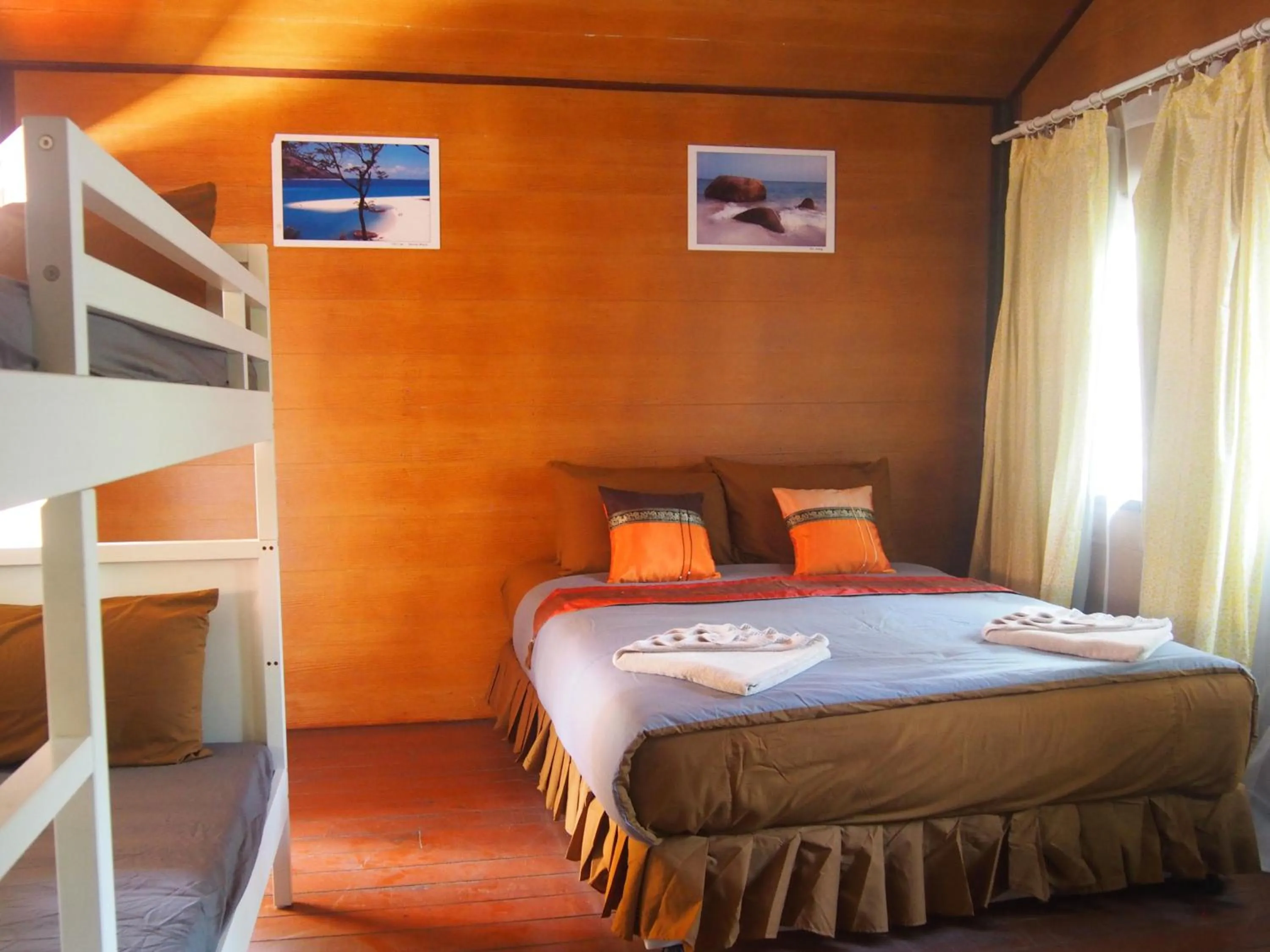 Bed in Coco Beach Bungalows