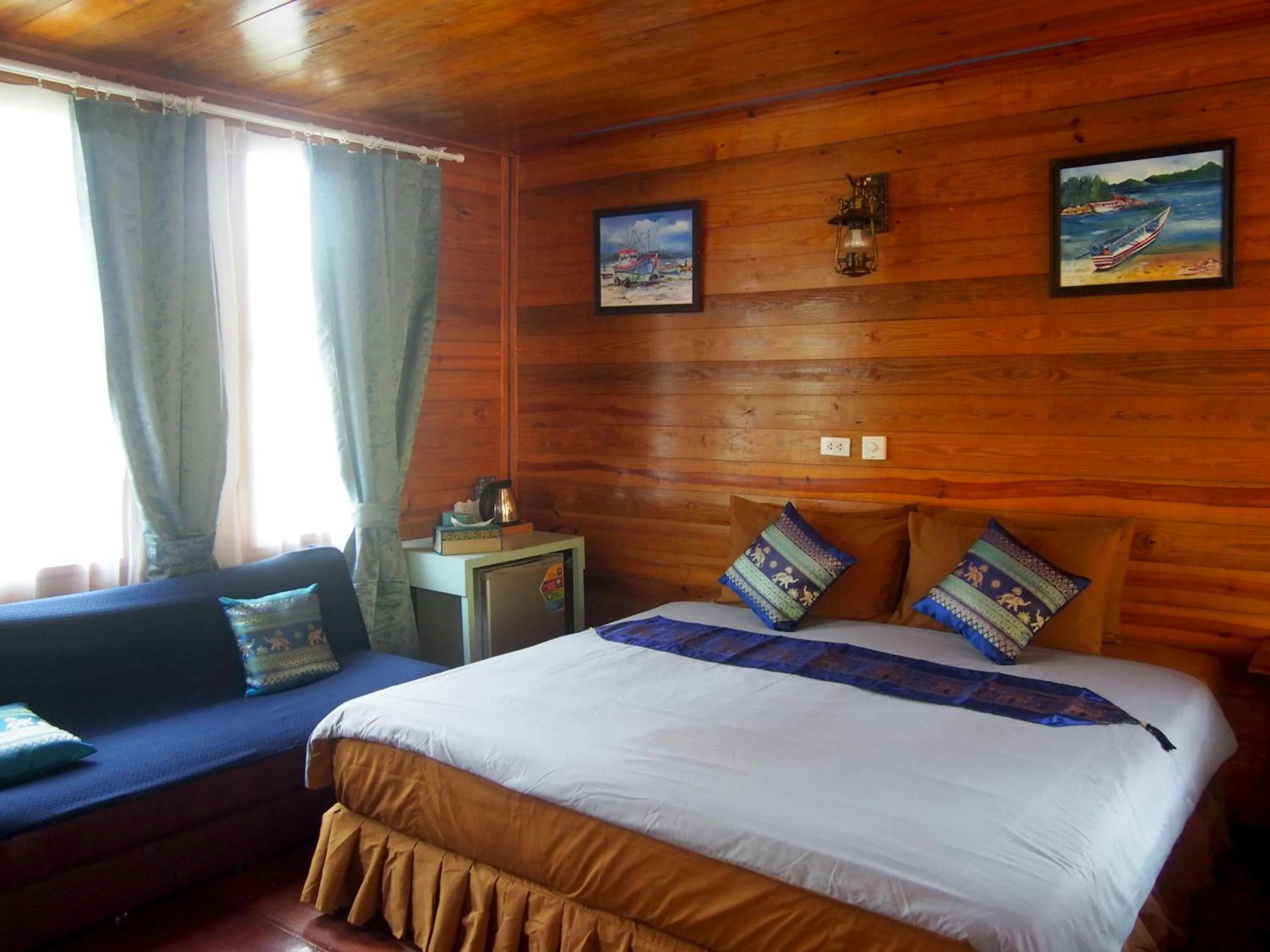 Bed in Coco Beach Bungalows