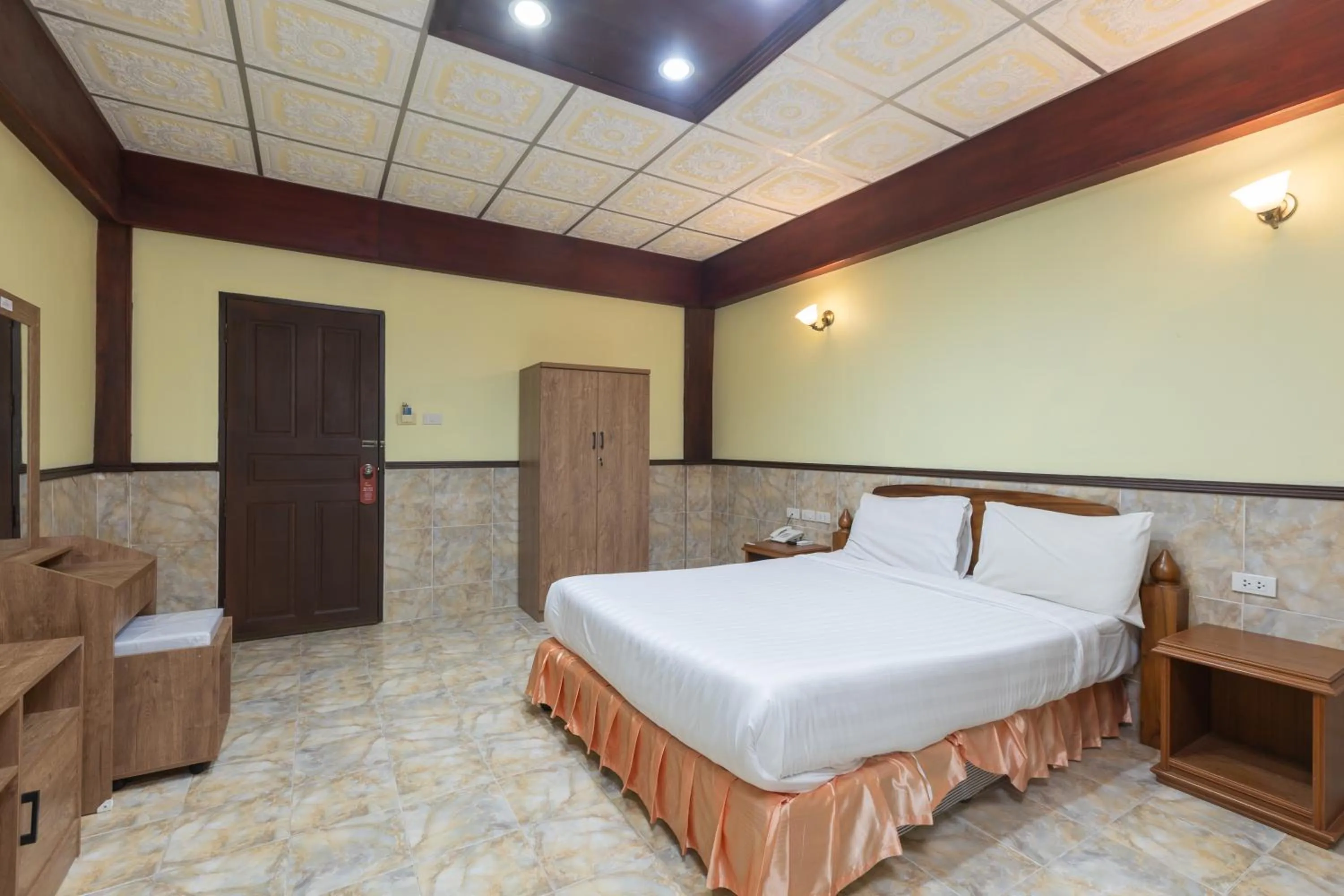 Bed in Kata Palace Phuket Hotel