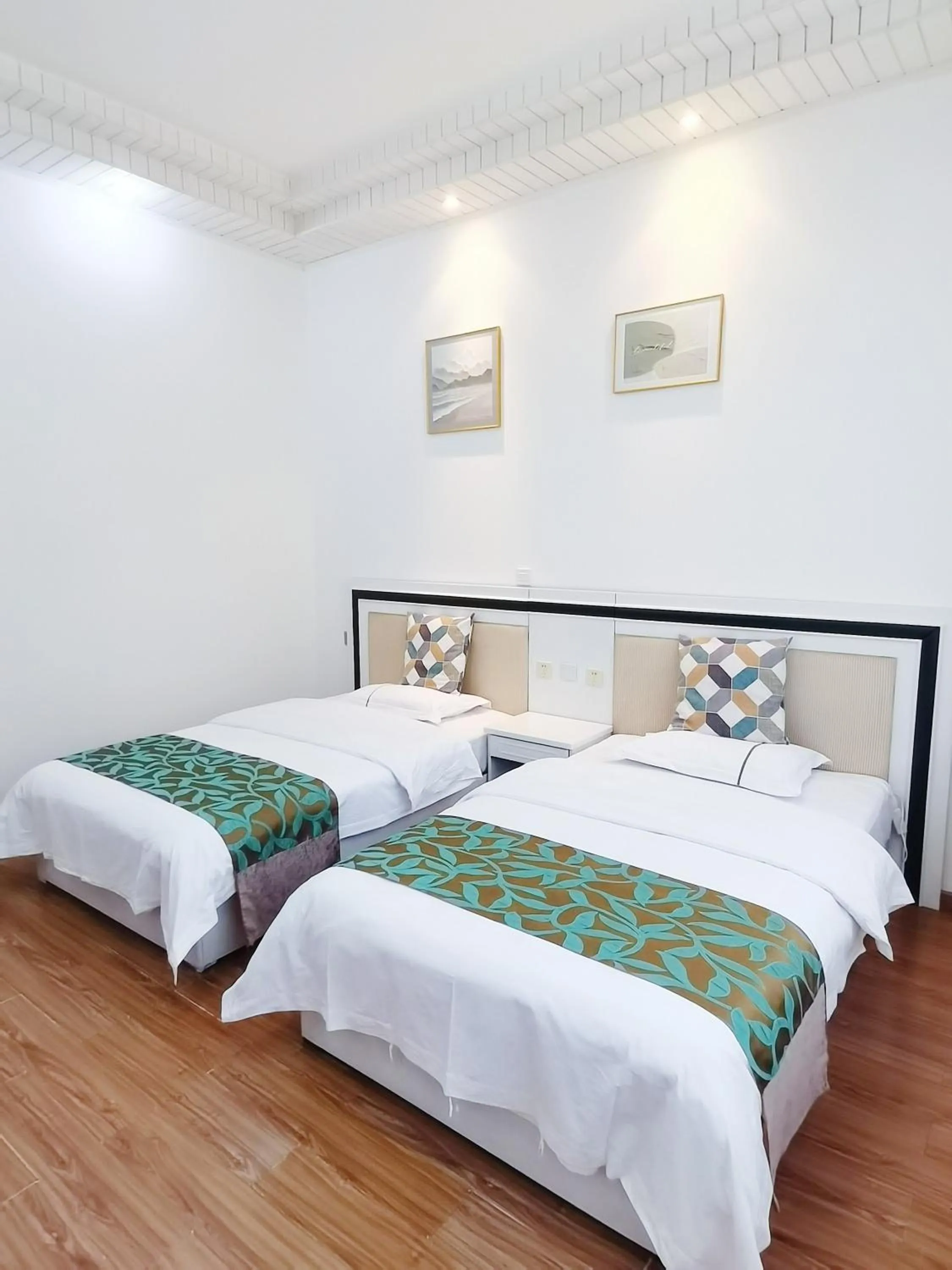 Bed in Emeishan Moon Bay Hotel