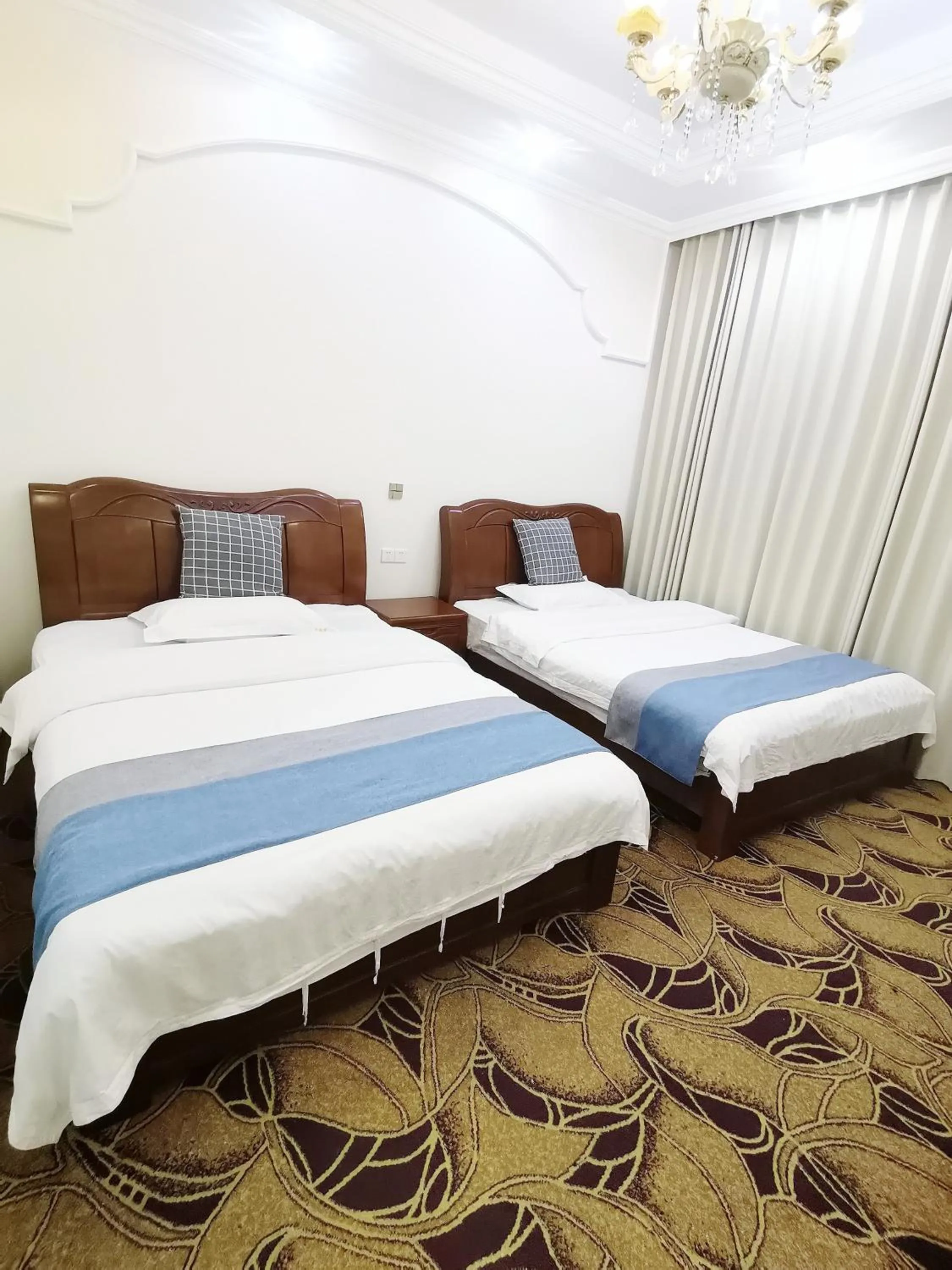 Bedroom, Bed in Emeishan Moon Bay Hotel