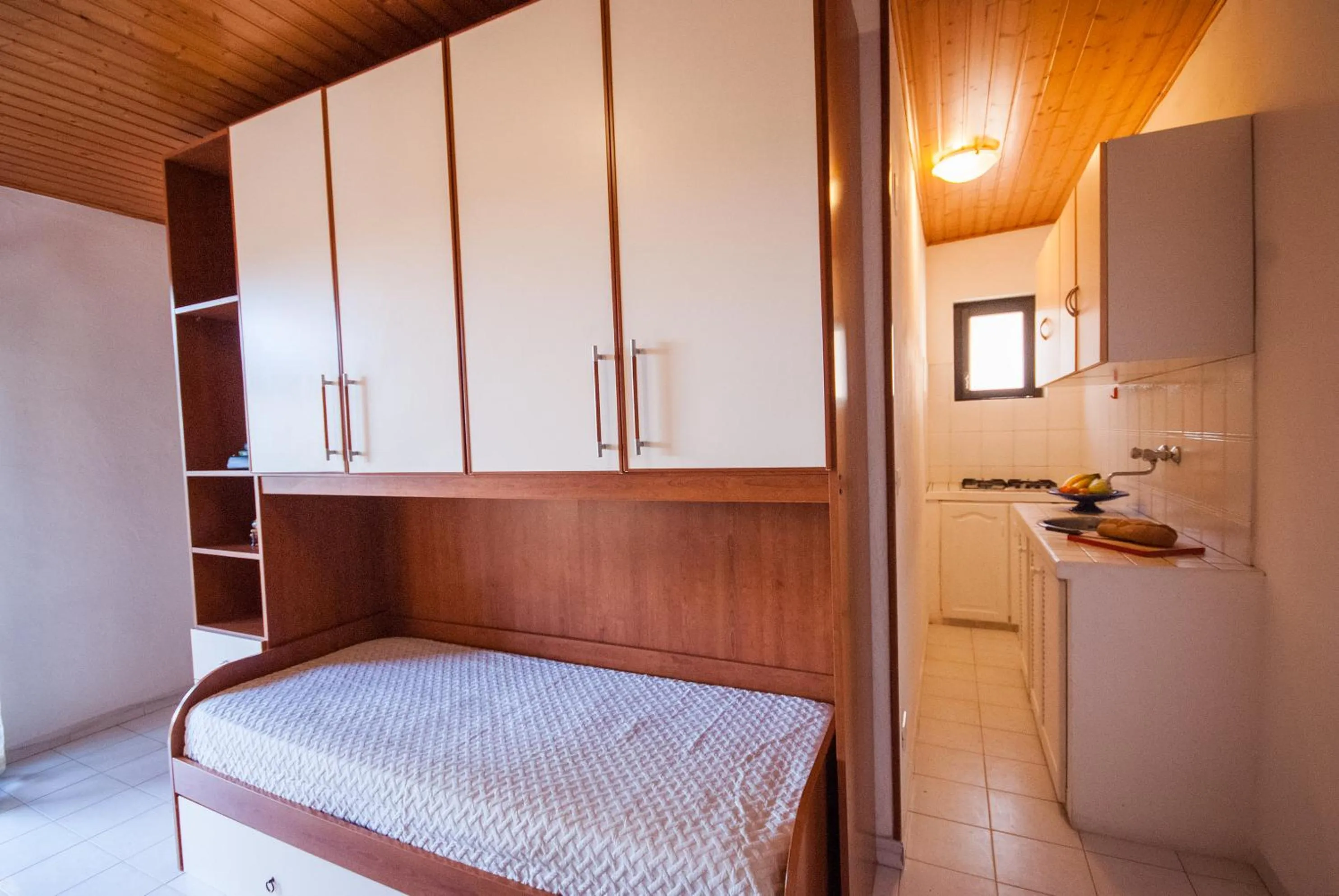 Kitchen or kitchenette, Bed in Residence La Valdana