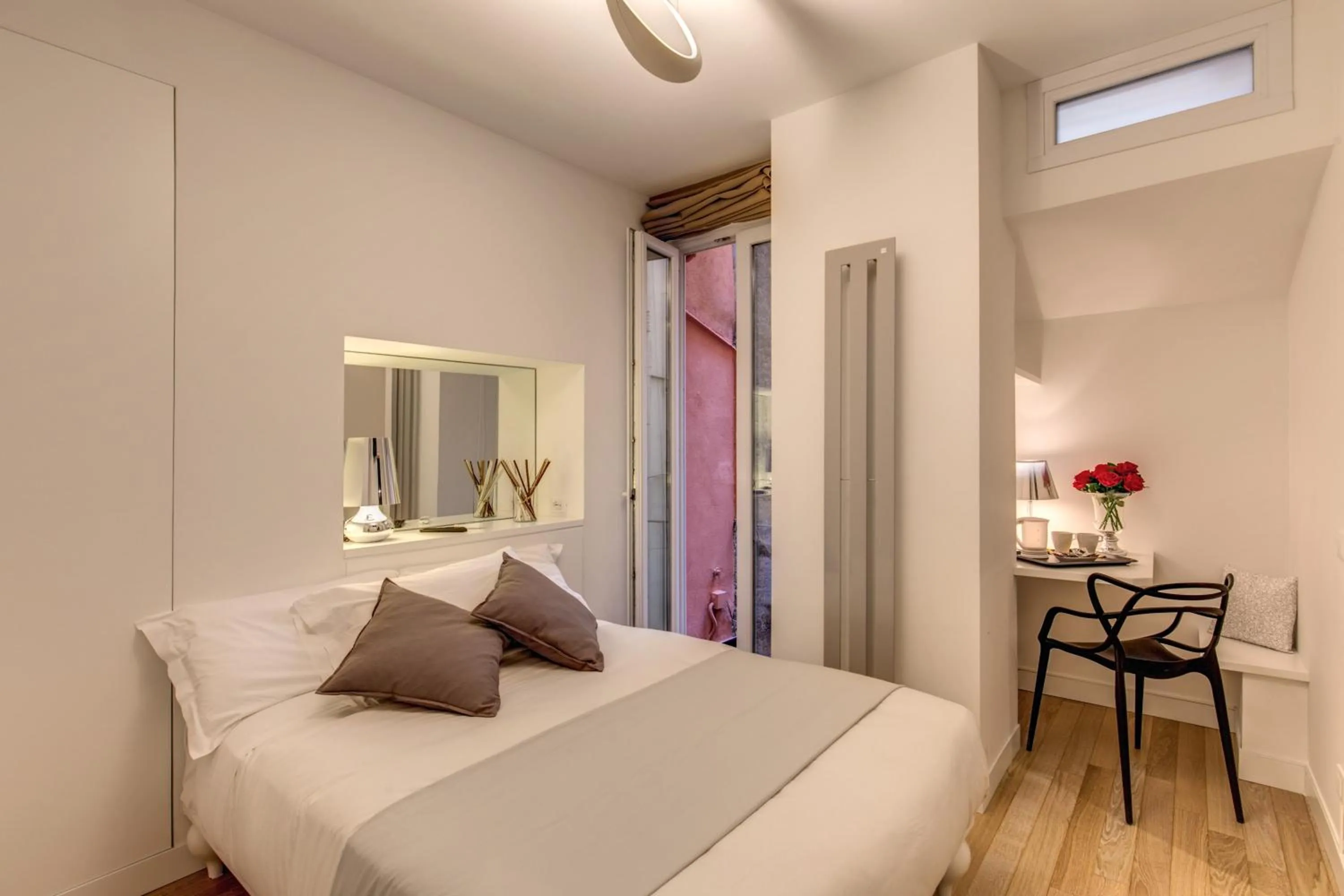 Photo of the whole room, Bed in Orange Suites