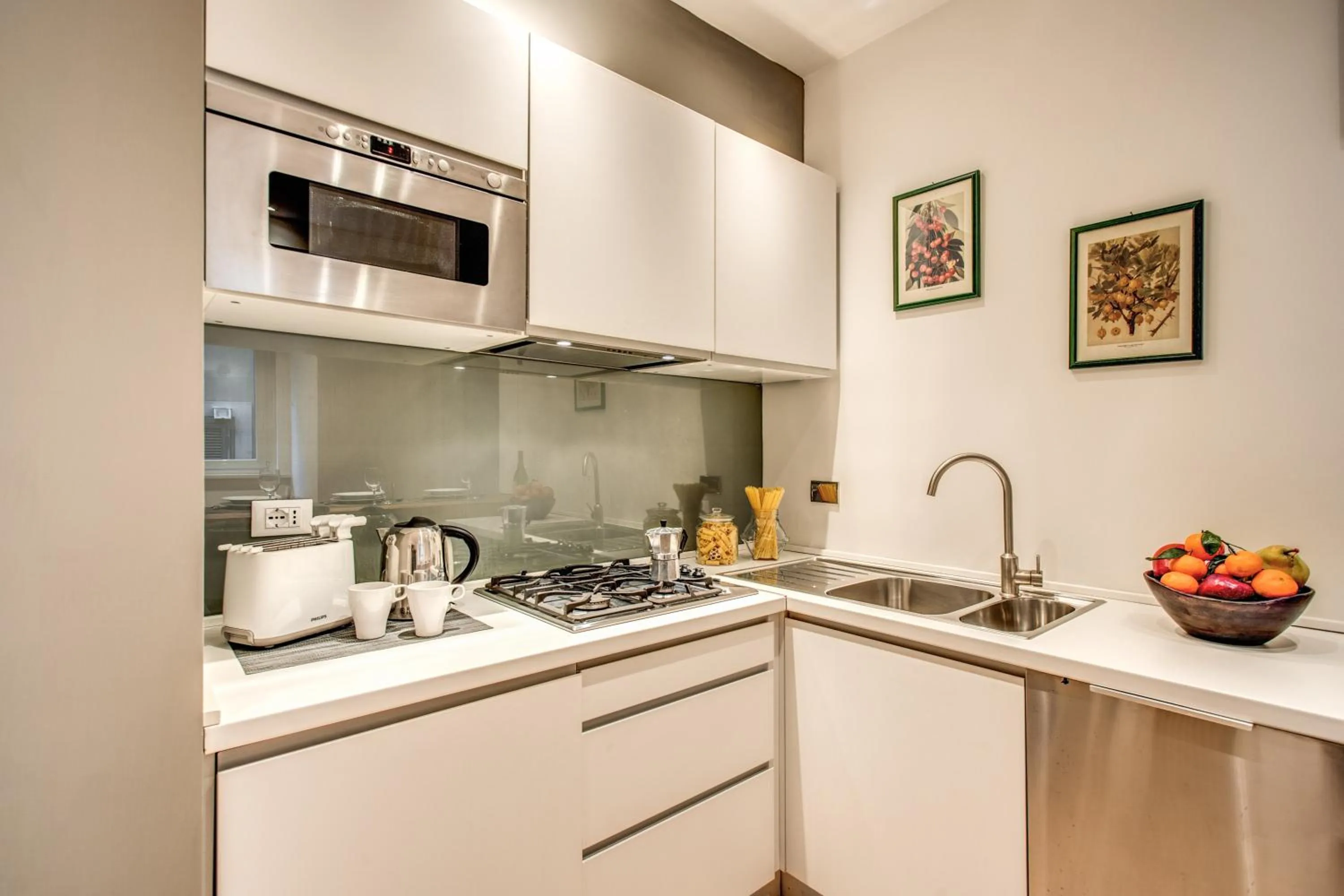 Kitchen or kitchenette in Orange Suites