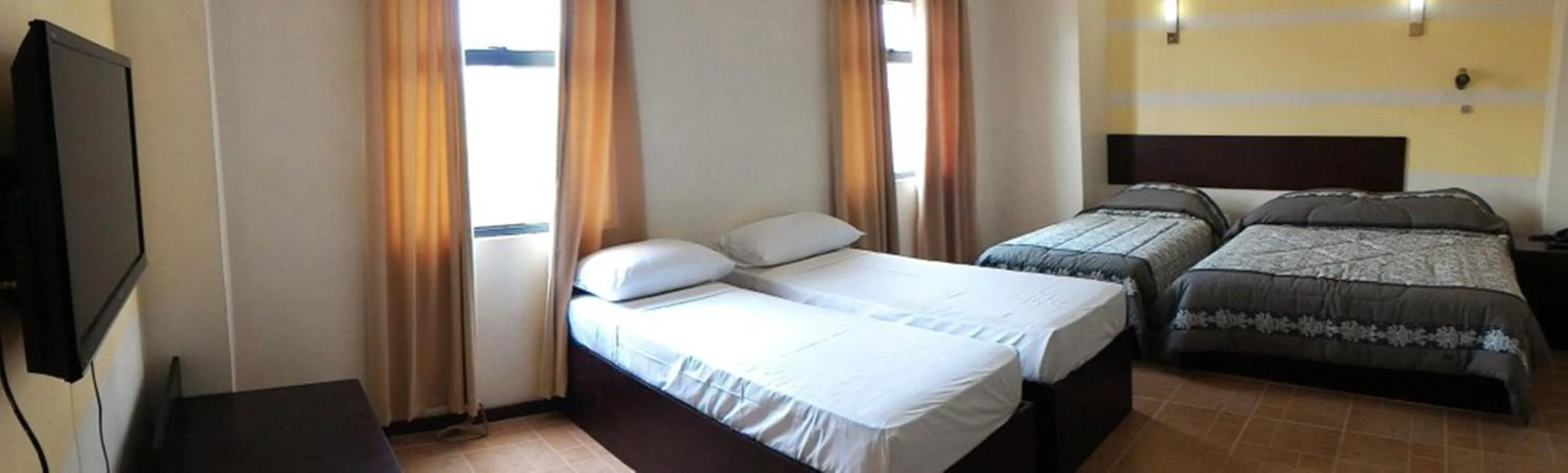 Photo of the whole room, Bed in Metro Park Hotel Mandaue