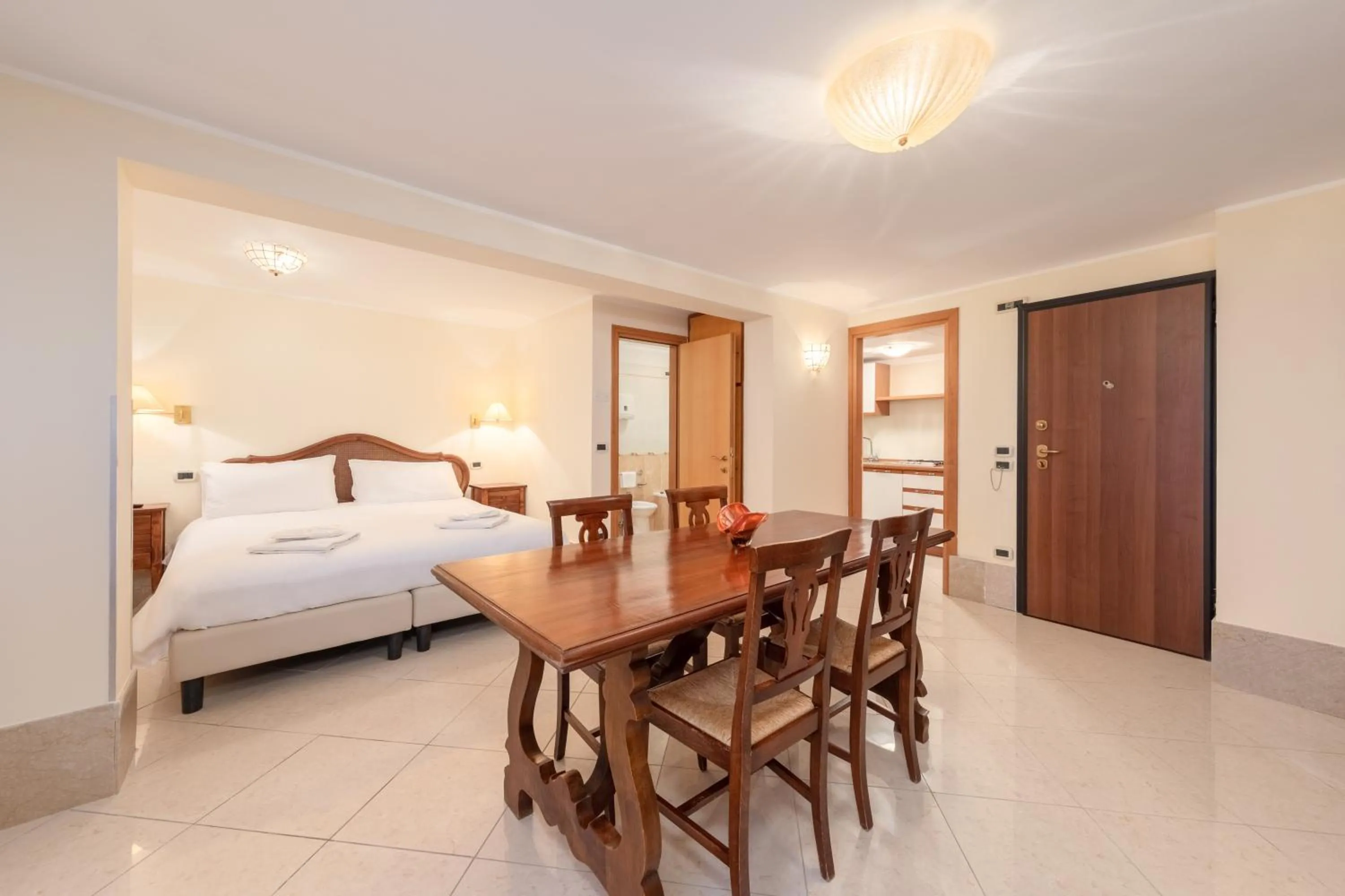 Photo of the whole room, Bed in La Locandiera