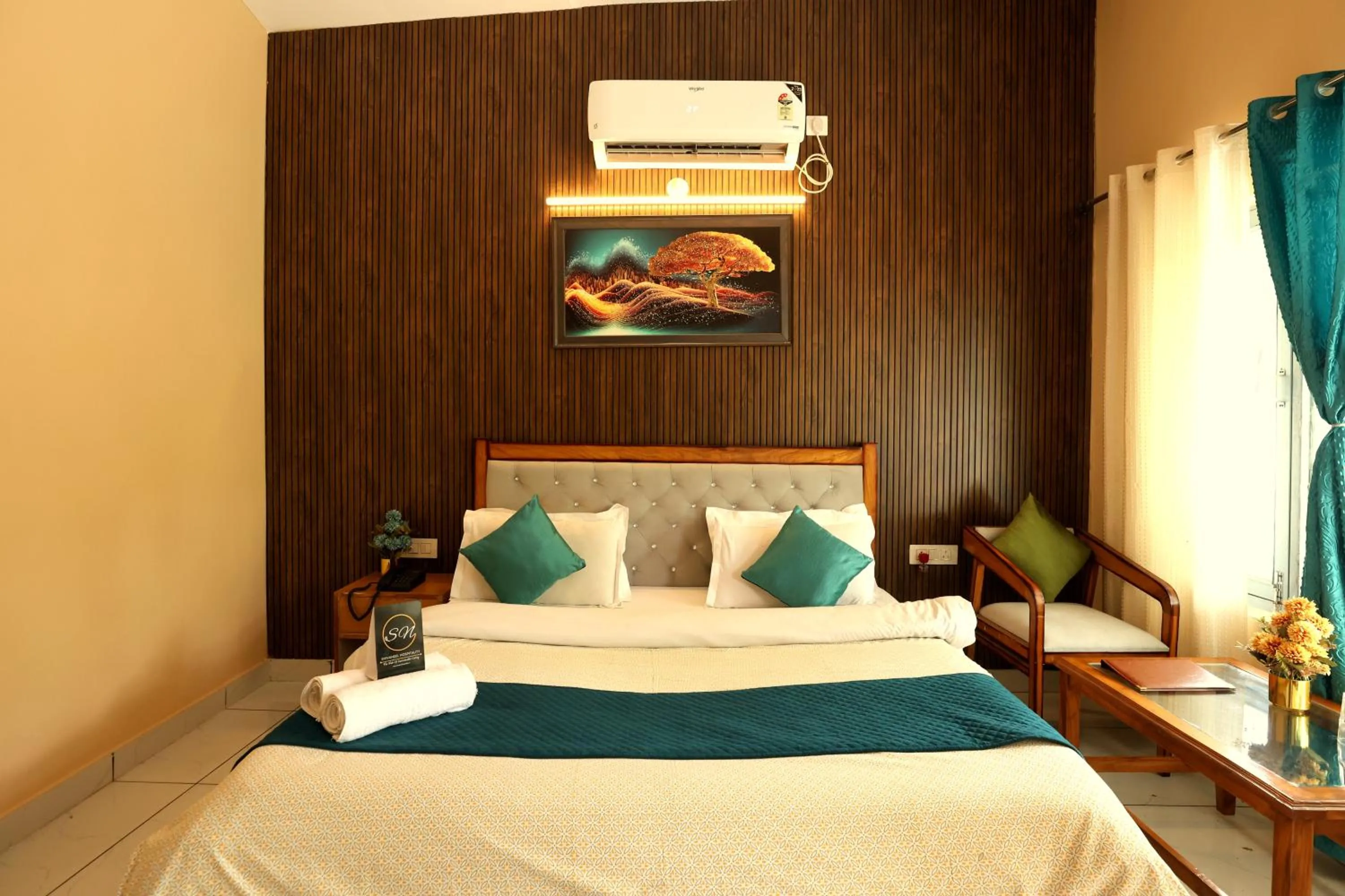 Bed in Aranya Resort & Suites By Shivaneel Hospitality