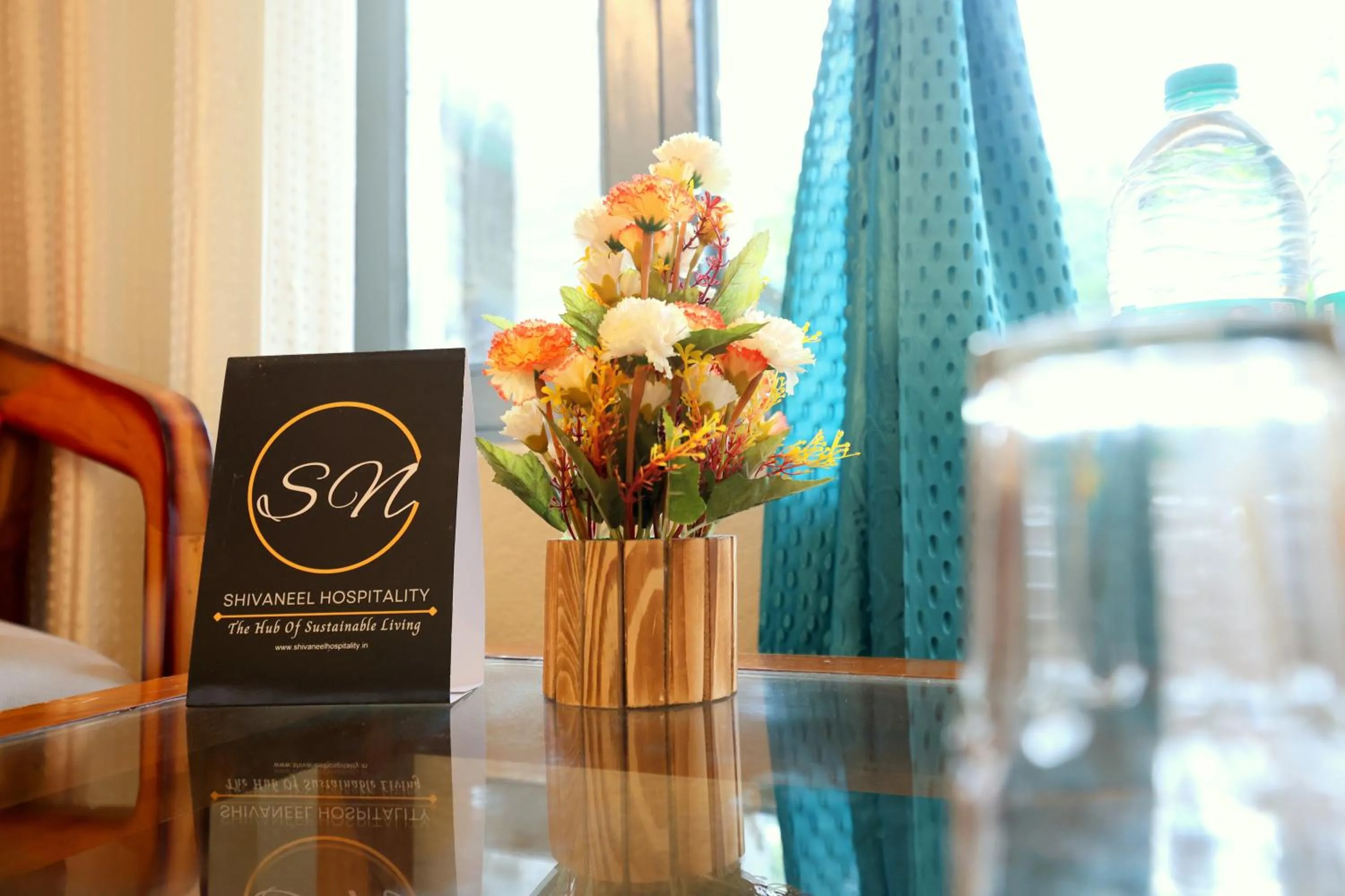 Property logo or sign in Aranya Resort & Suites By Shivaneel Hospitality