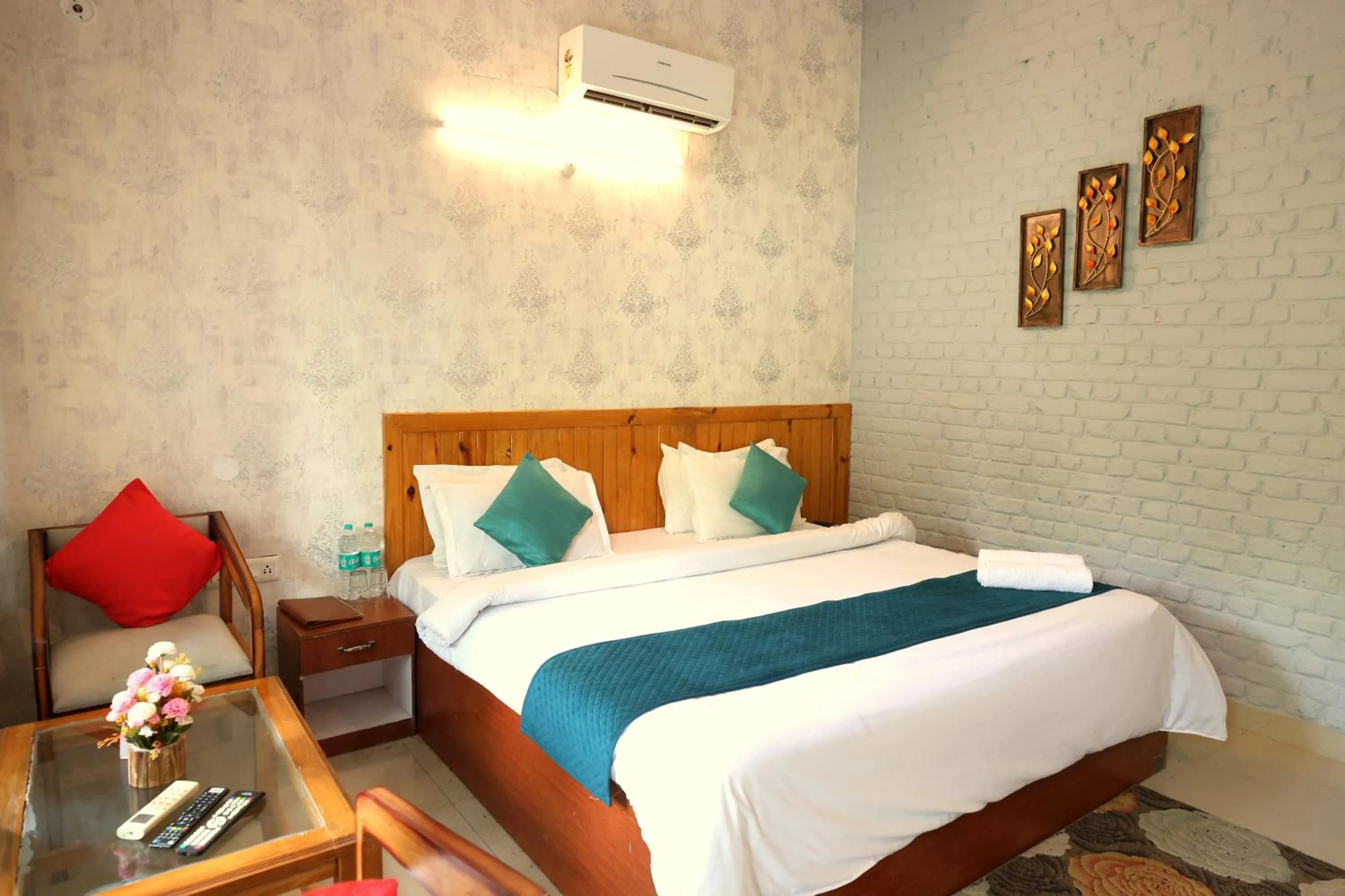Bed in Aranya Resort & Suites By Shivaneel Hospitality