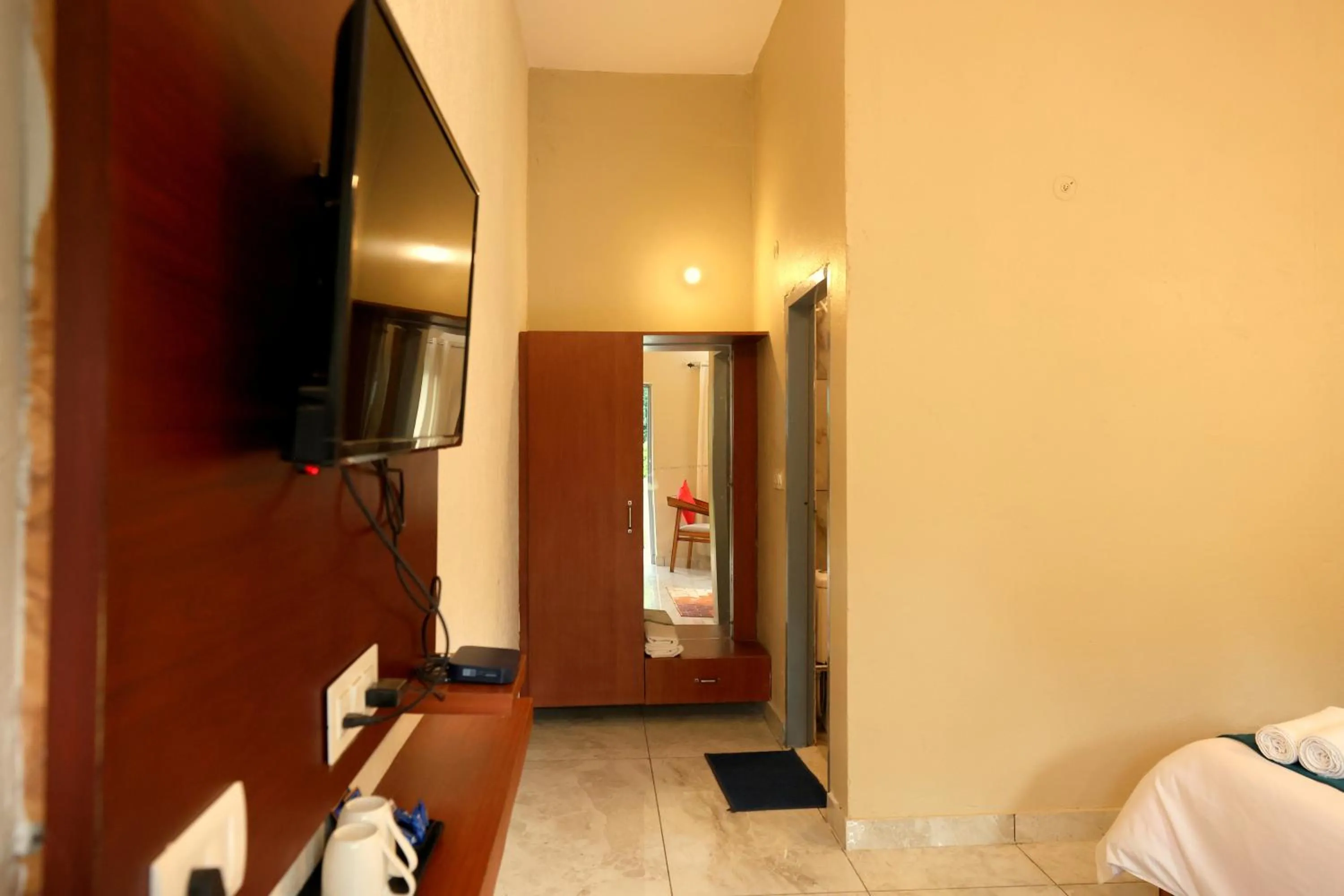 TV and multimedia, Bed in Aranya Resort & Suites By Shivaneel Hospitality