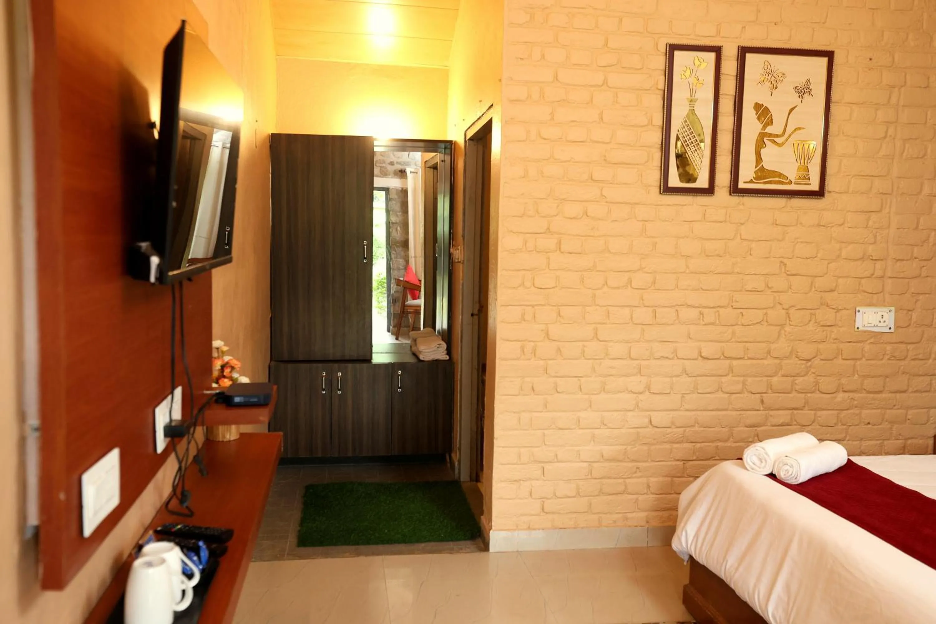 TV and multimedia, Bed in Aranya Resort & Suites By Shivaneel Hospitality