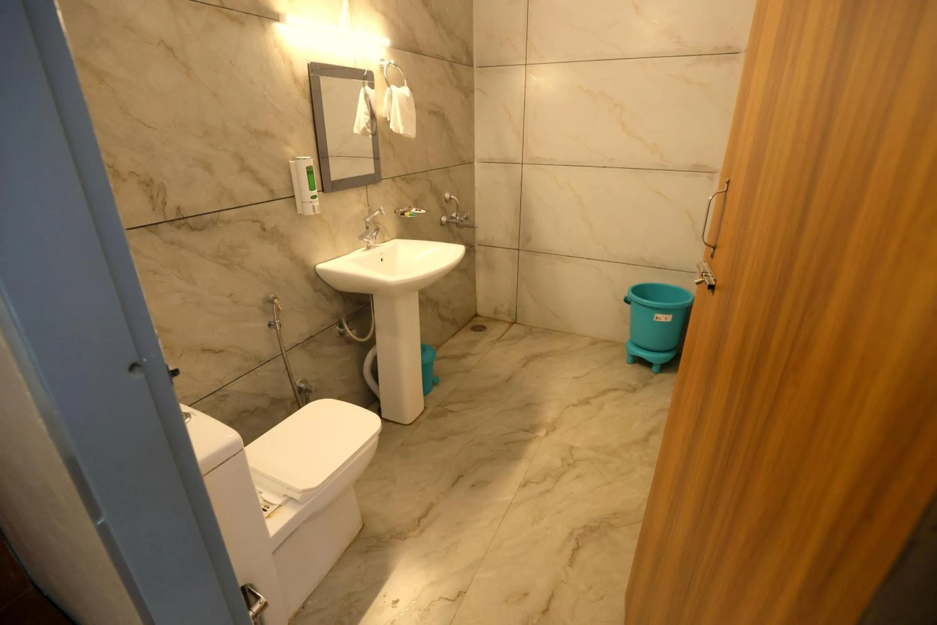 Bathroom in Aranya Resort & Suites By Shivaneel Hospitality