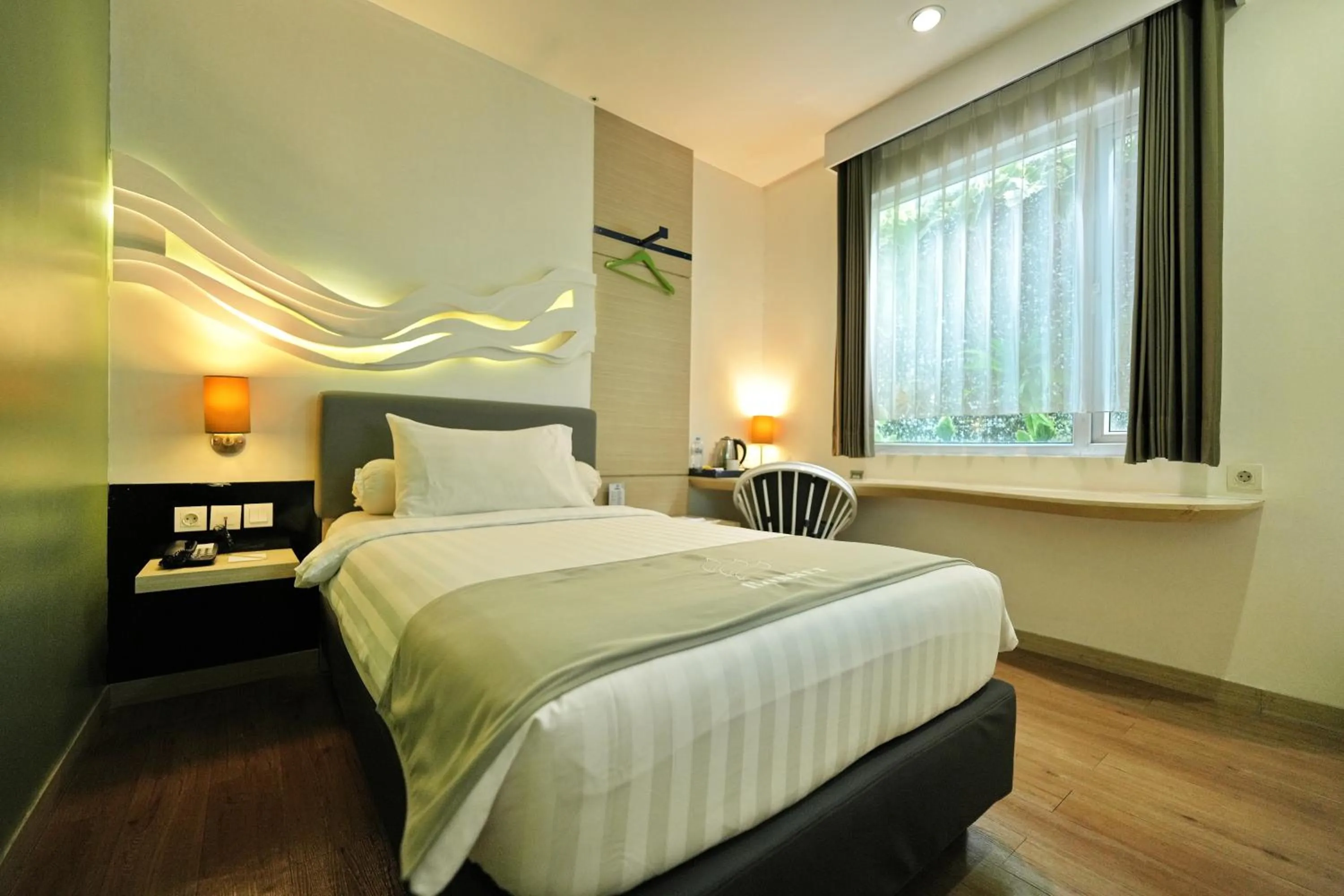 Bed in Bonnet Hotel Surabaya