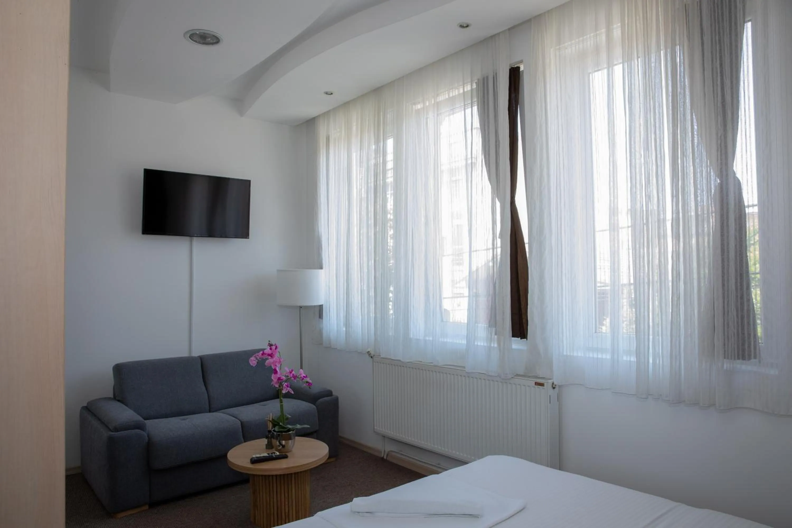 Bed in Garni Hotel Biser