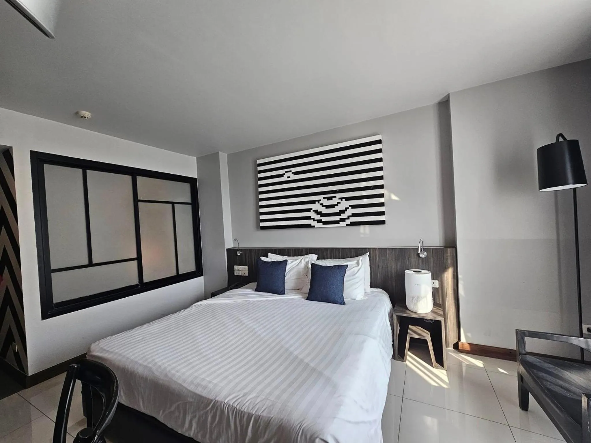 Bed in Art Mai Gallery Nimman Hotel Chiang Mai