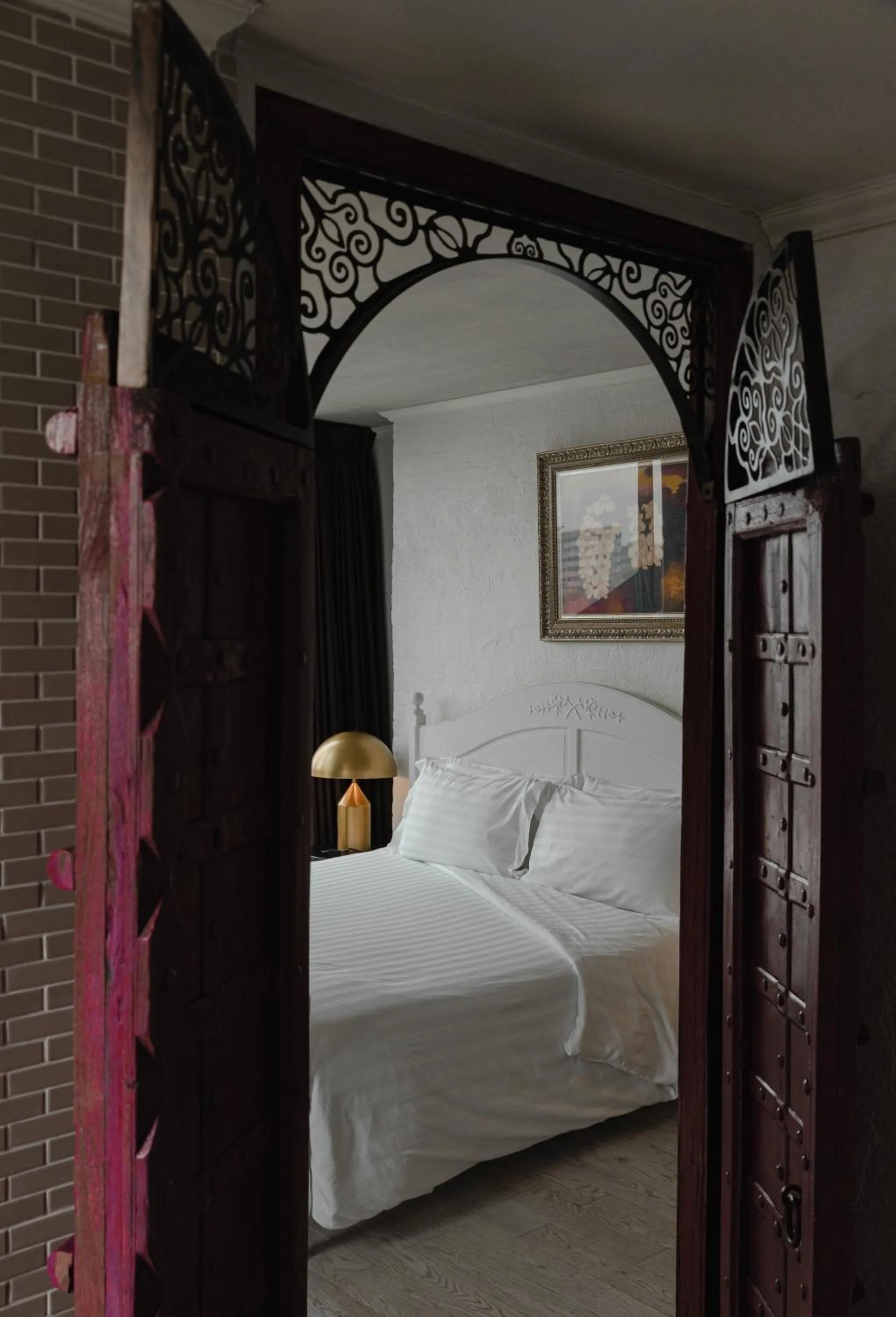 Bed in Art Mai Gallery Nimman Hotel Chiang Mai