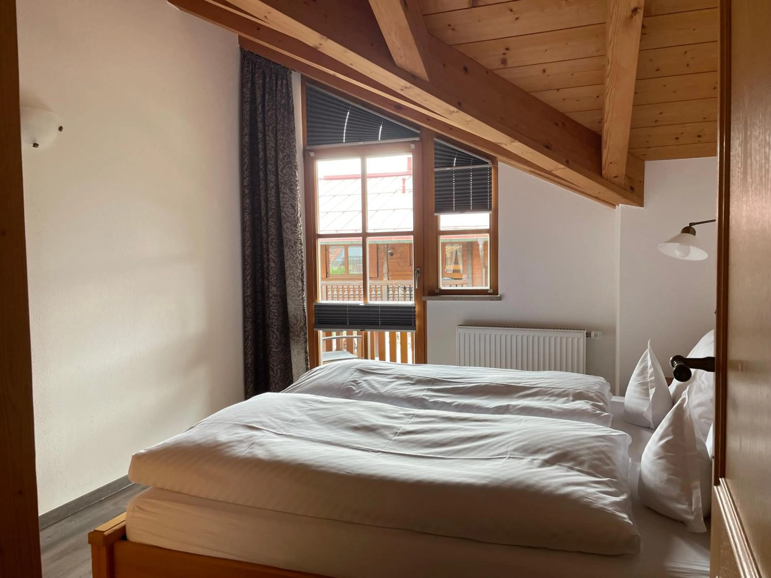 Bed in Ferienwohnungen Beim Hausbacher