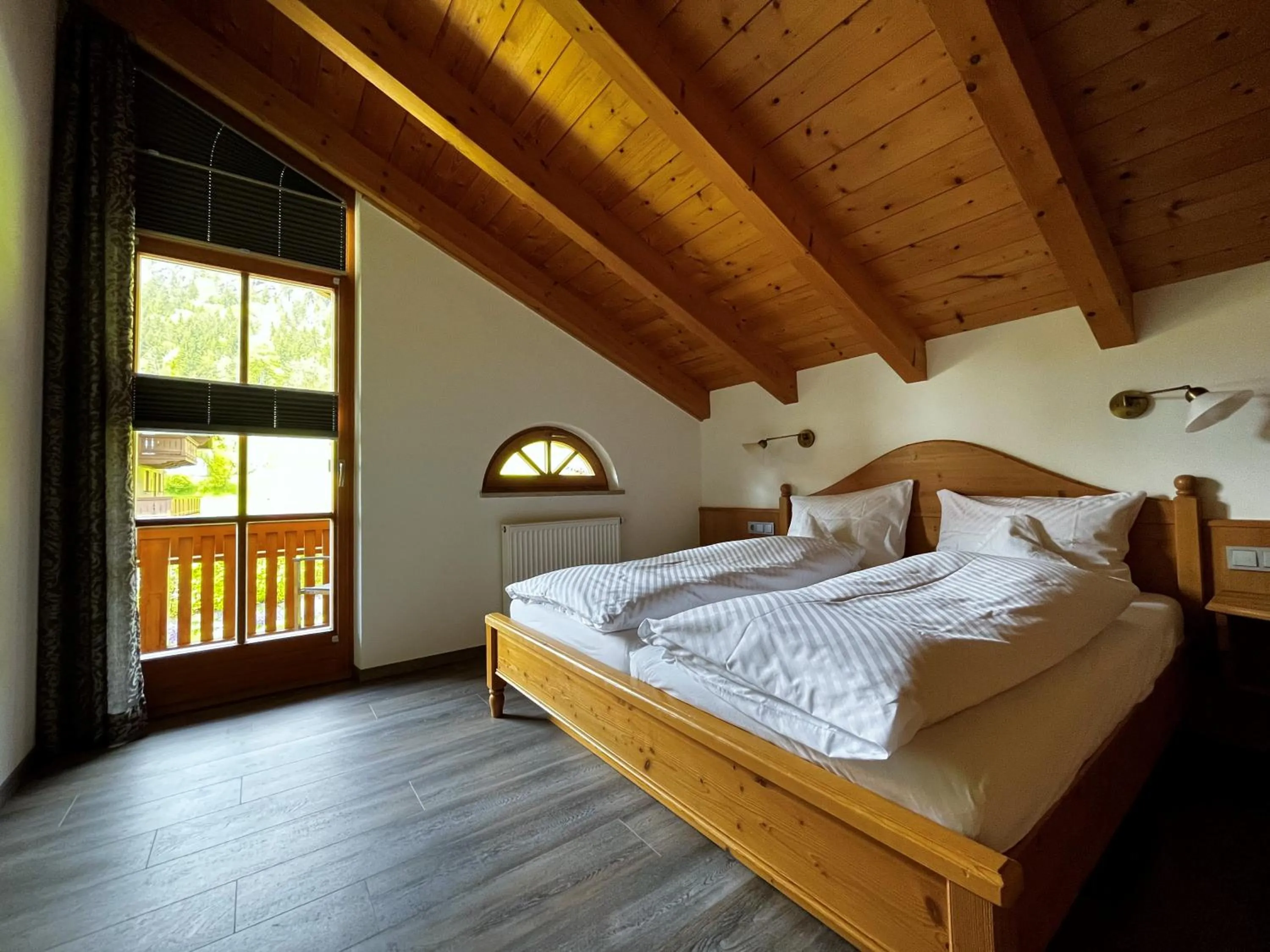 Bed in Ferienwohnungen Beim Hausbacher