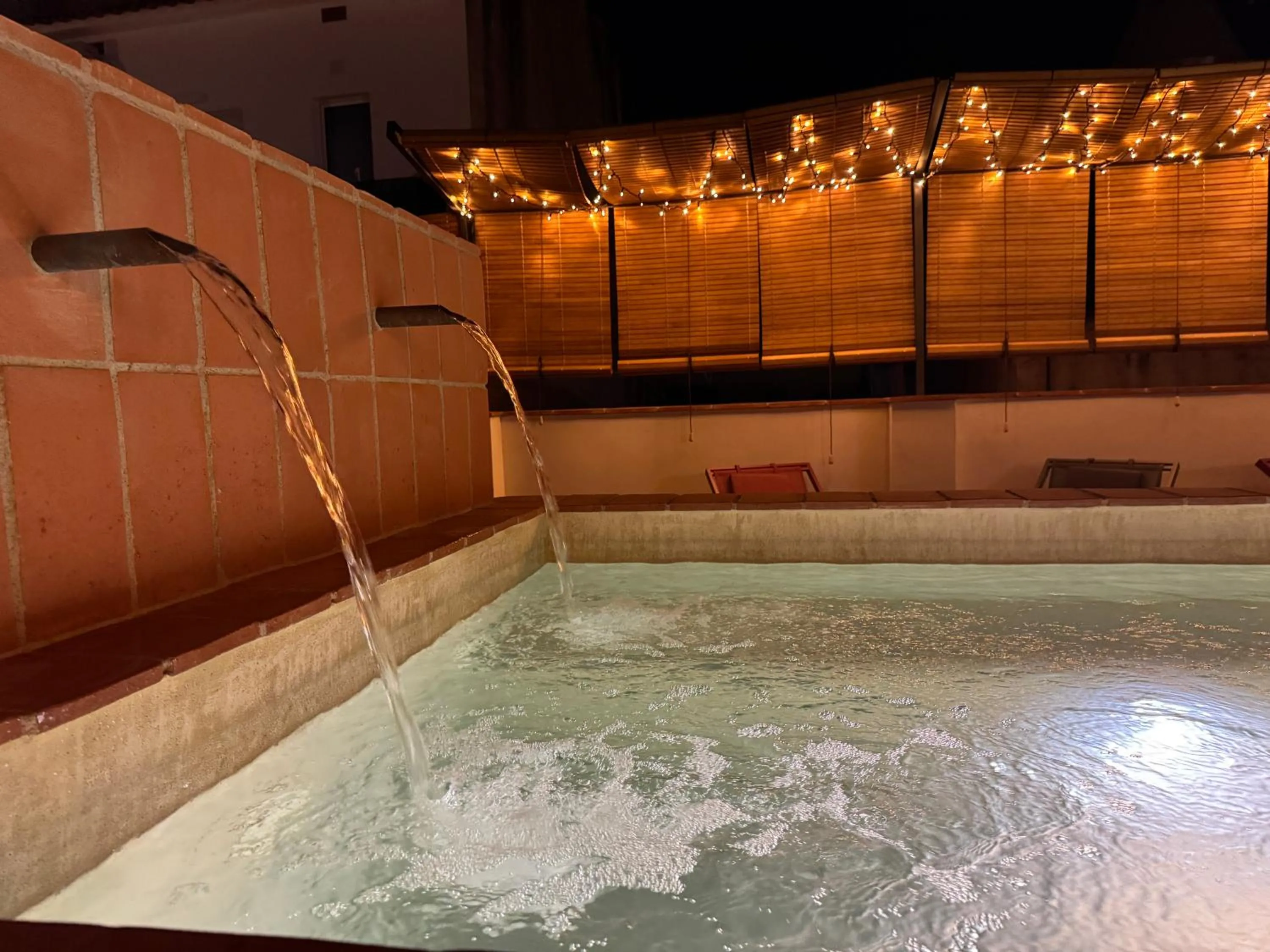 Swimming pool in BELLADORA Hotel Boutique