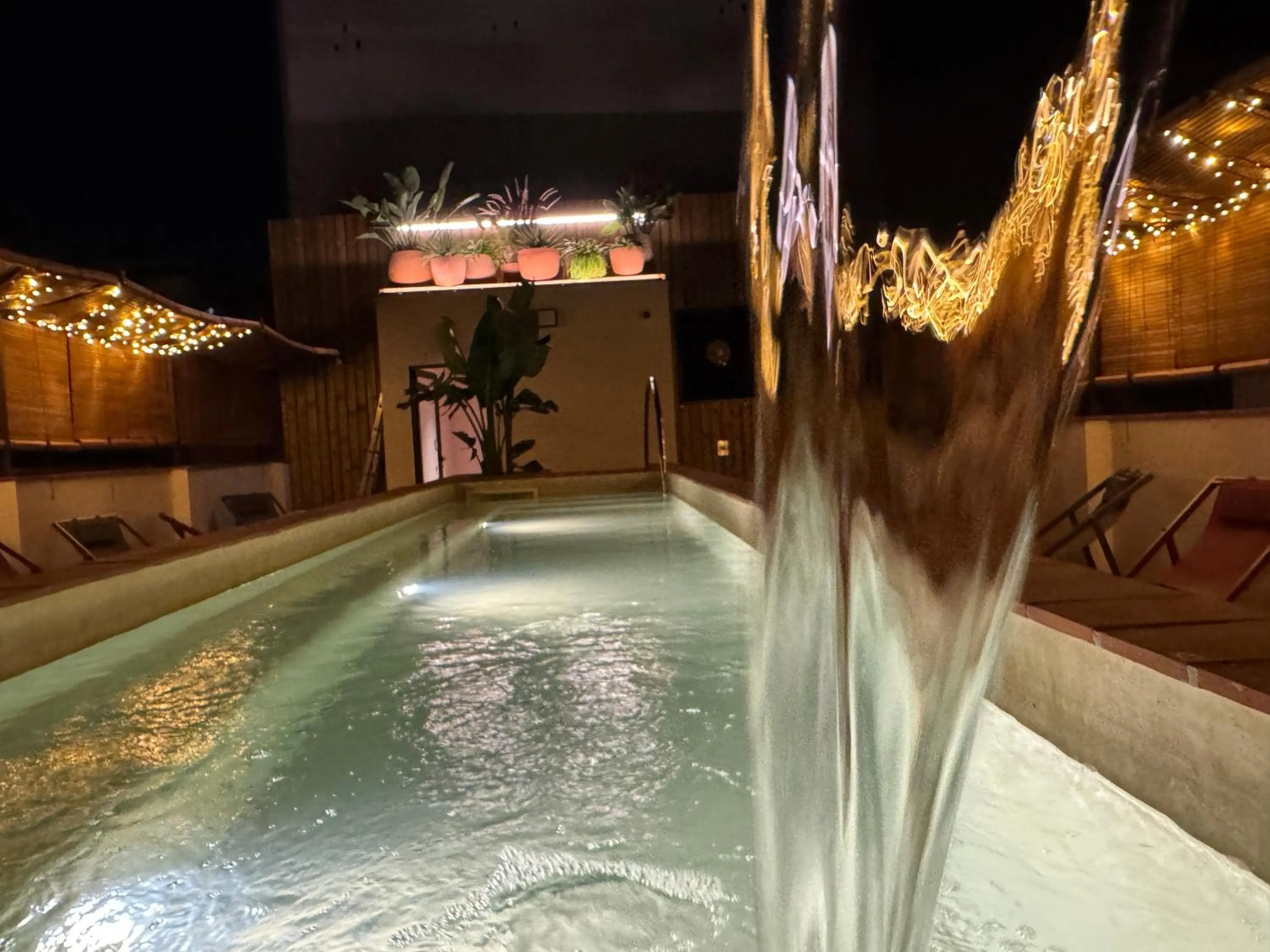 Swimming pool in BELLADORA Hotel Boutique
