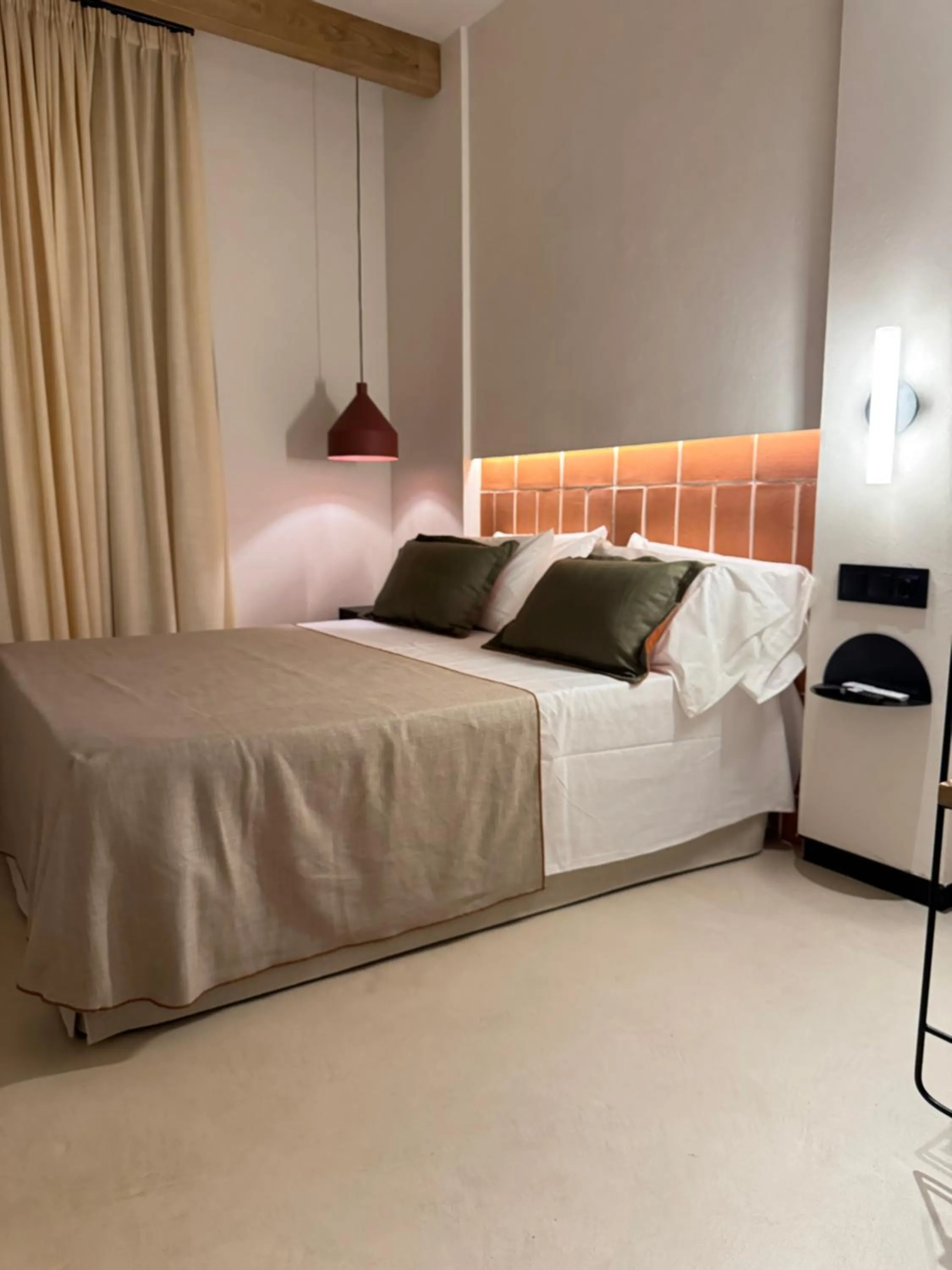 Bed in BELLADORA Hotel Boutique