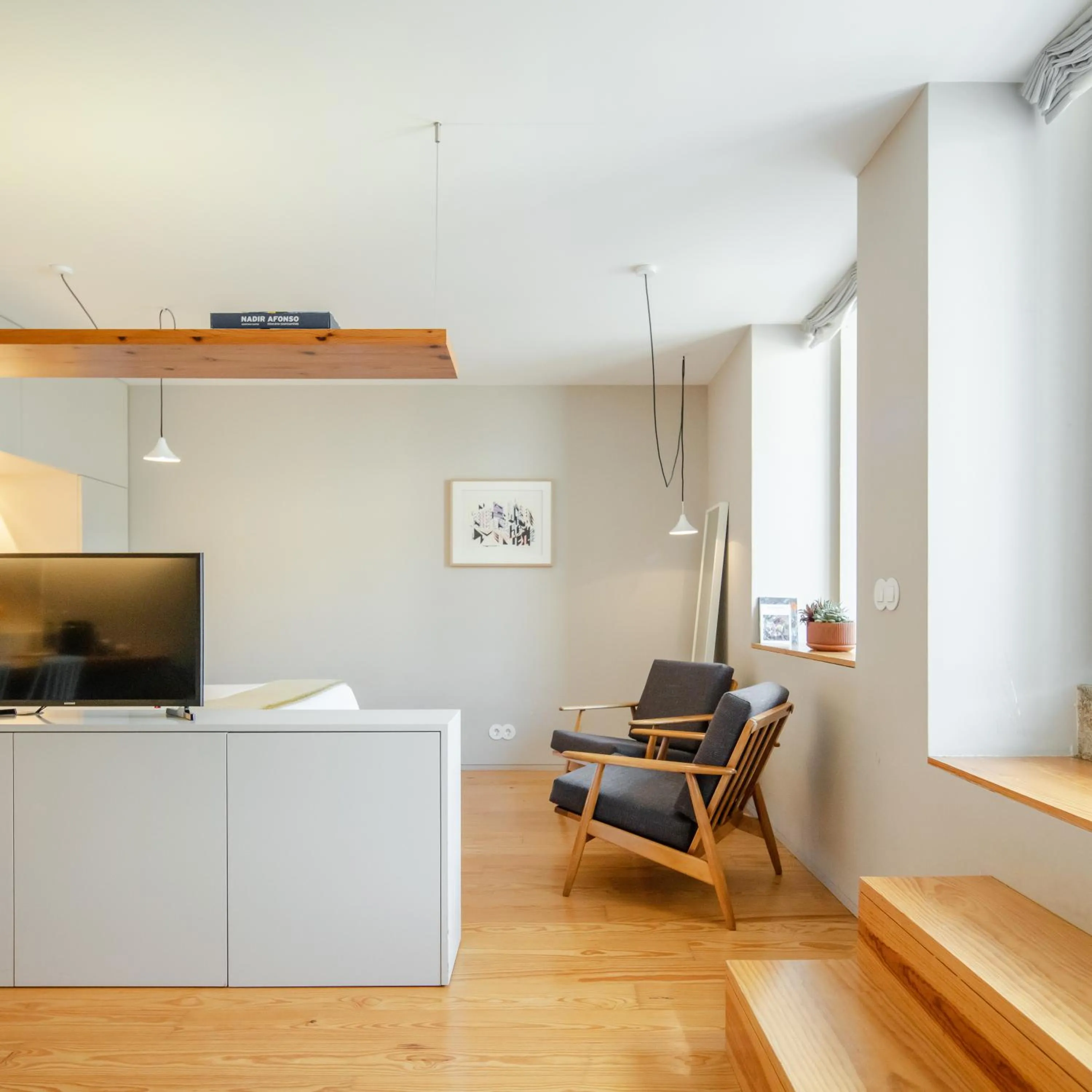 TV and multimedia in Baumhaus Serviced Living - Art & Design Apartments