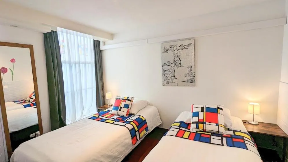 Bed in The Amsterdam Hotel Apartment in the Center