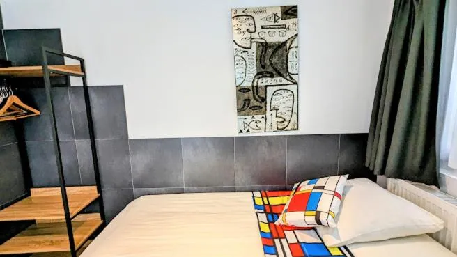 Bed in The Amsterdam Hotel Apartment in the Center