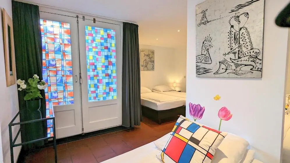 Bed in The Amsterdam Hotel Apartment in the Center