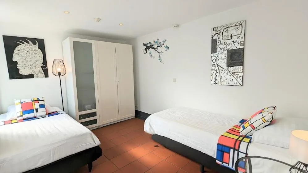 Bed in The Amsterdam Hotel Apartment in the Center