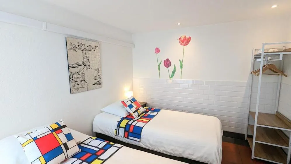 Bed in The Amsterdam Hotel Apartment in the Center