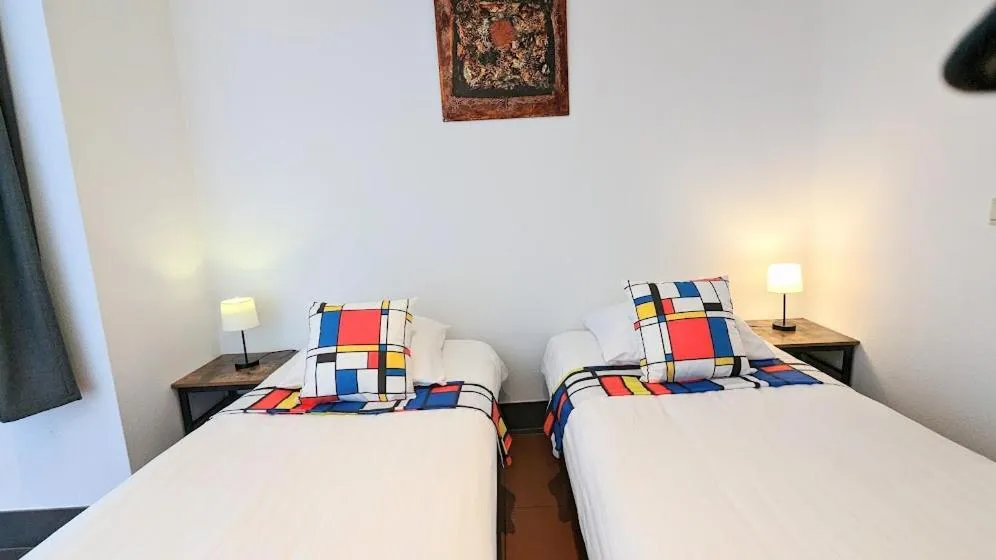 Bed in The Amsterdam Hotel Apartment in the Center