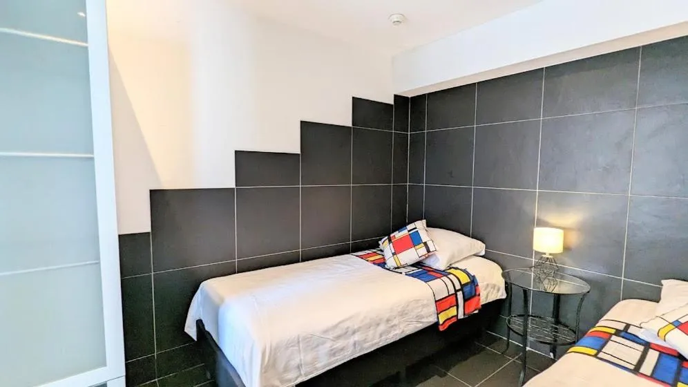 Bed in The Amsterdam Hotel Apartment in the Center