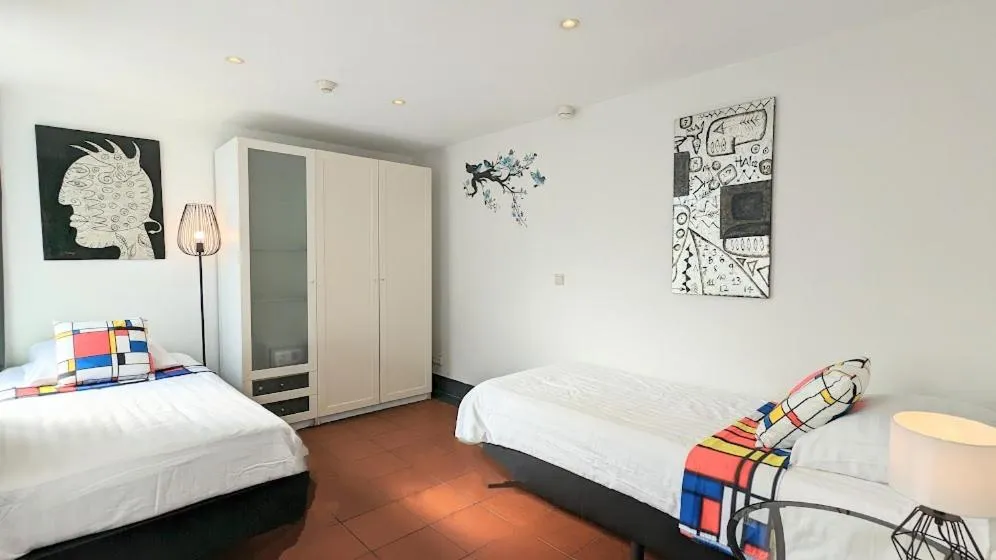 Bed in The Amsterdam Hotel Apartment in the Center