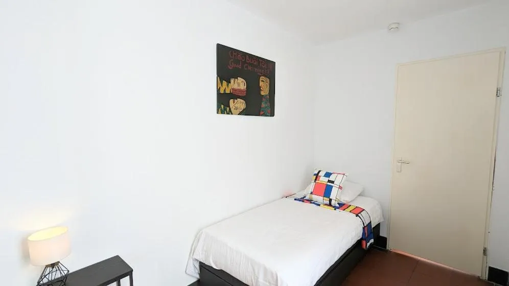 Bed in The Amsterdam Hotel Apartment in the Center