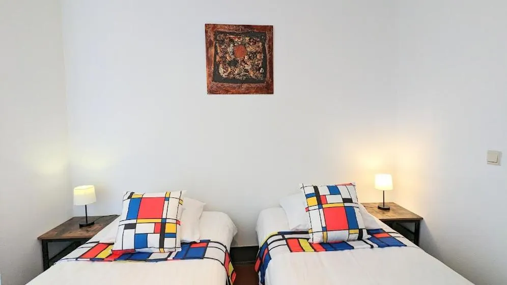 Bed in The Amsterdam Hotel Apartment in the Center