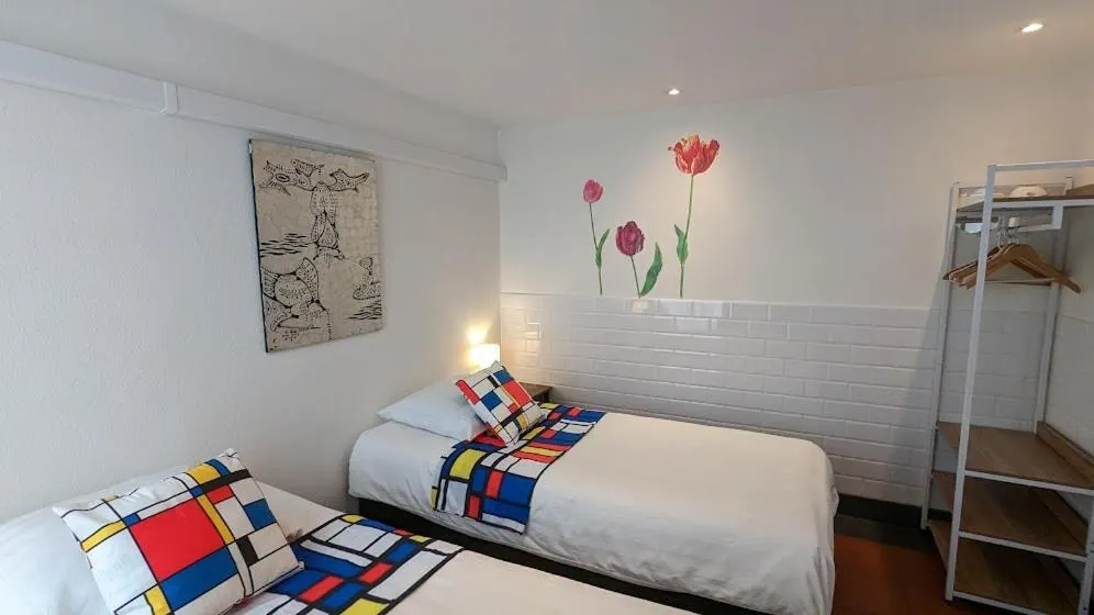 Bed in The Amsterdam Hotel Apartment in the Center