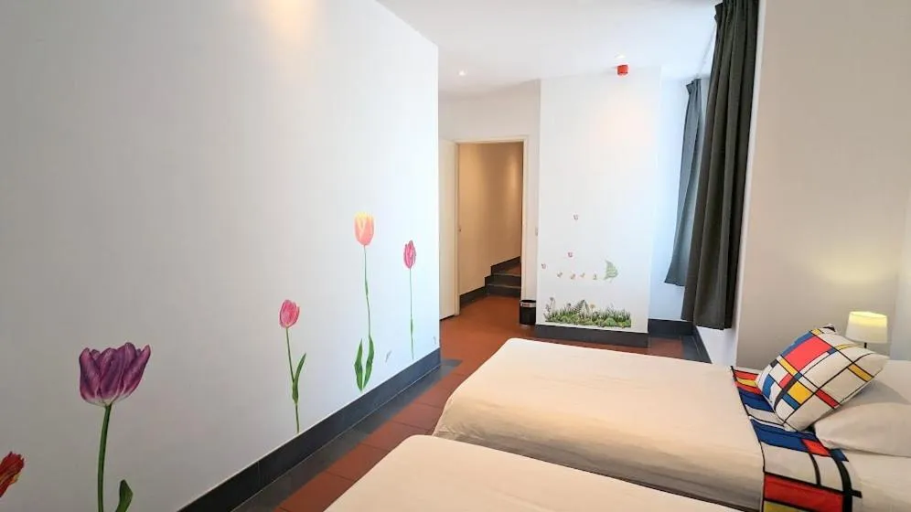 Bed in The Amsterdam Hotel Apartment in the Center