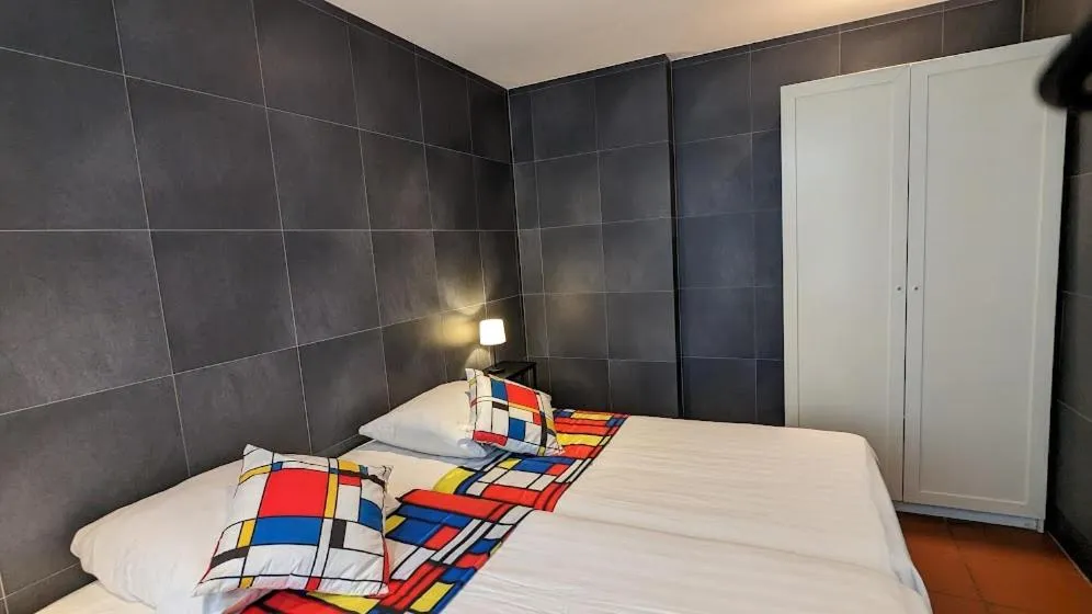 Bed in The Amsterdam Hotel Apartment in the Center