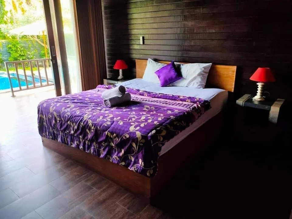 Bed in Bunutbali Villas88