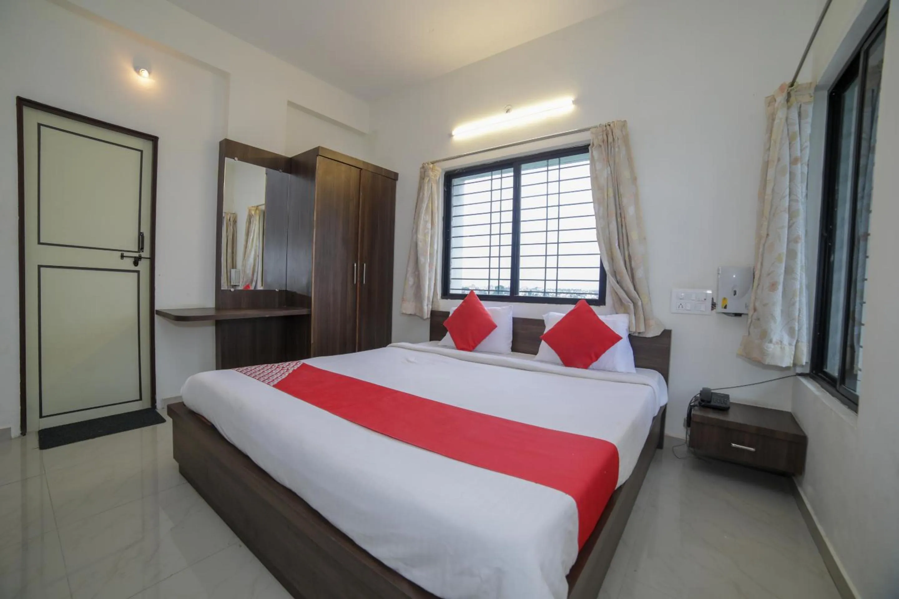 Bed in Hotel O Seva Service Apartment