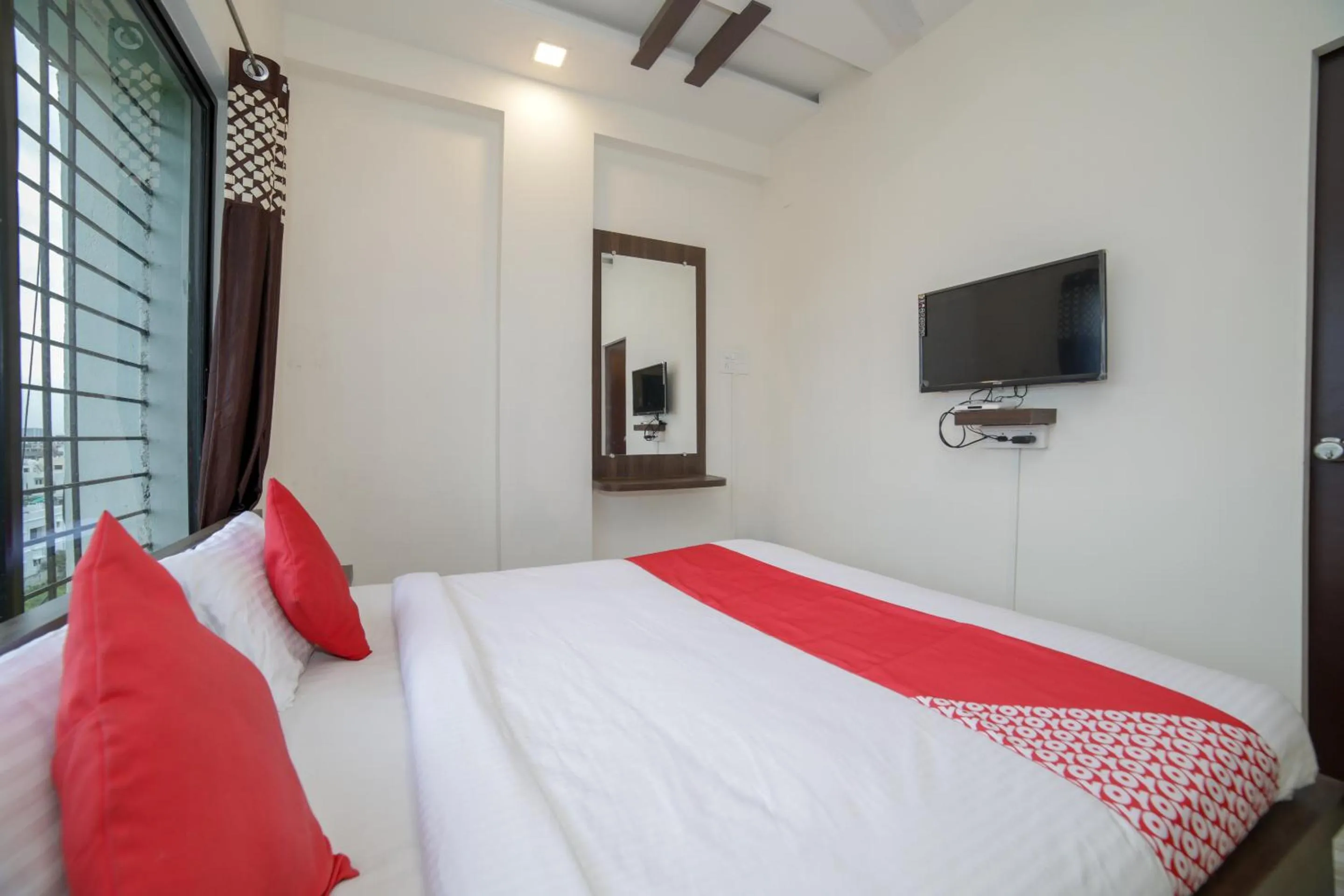 Bed in Hotel O Seva Service Apartment