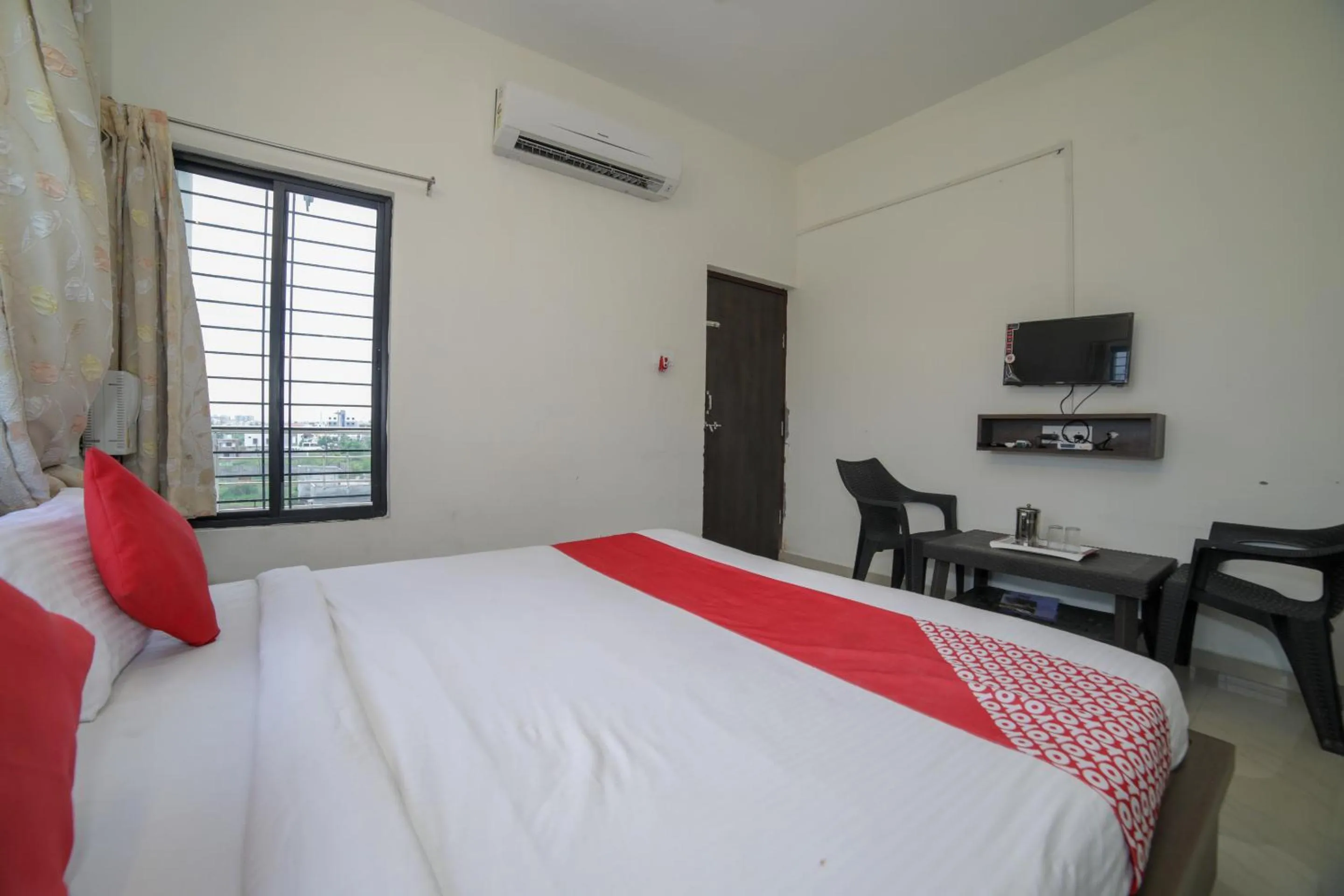 Bed in Hotel O Seva Service Apartment