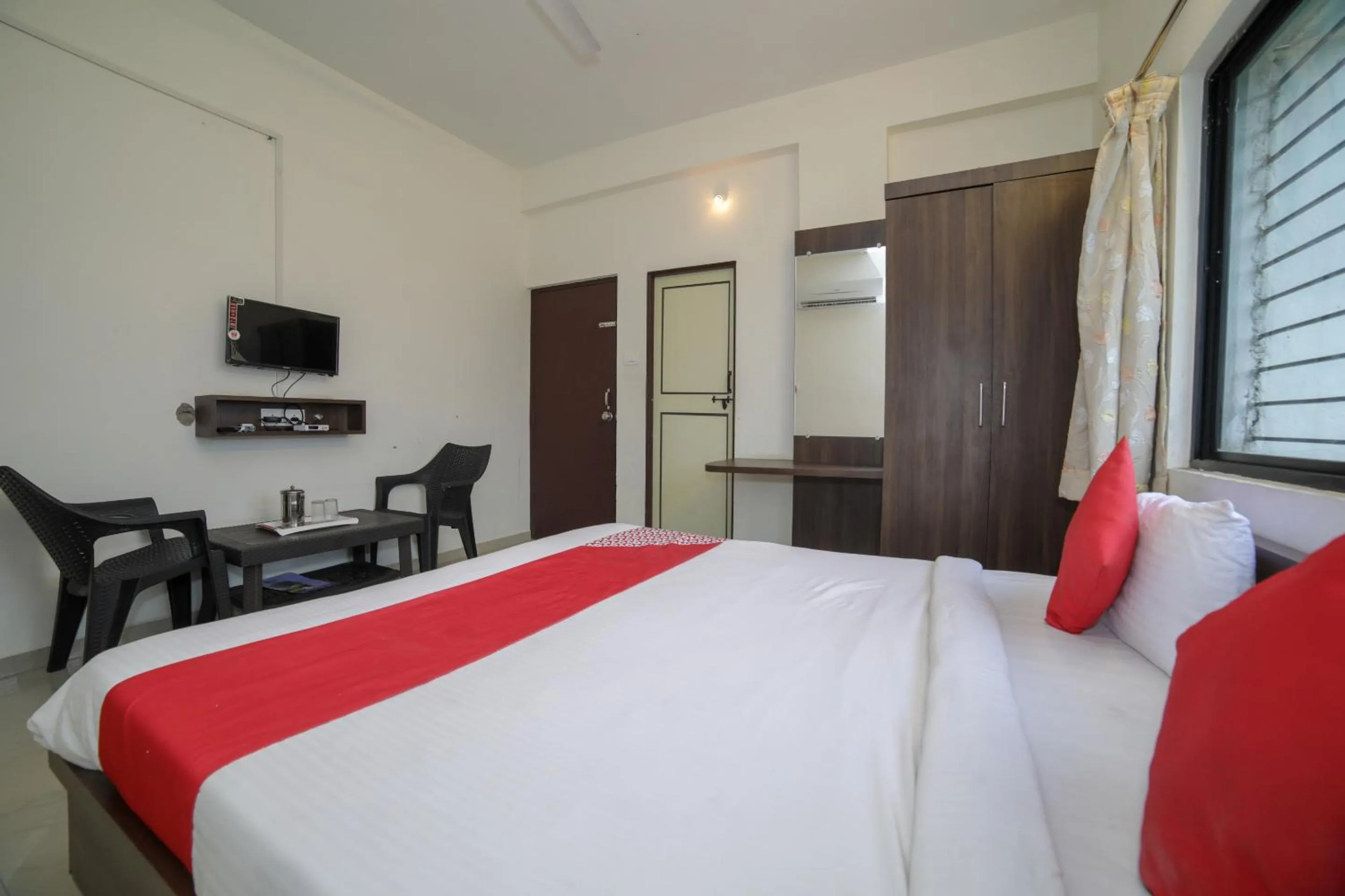 Bed in Hotel O Seva Service Apartment