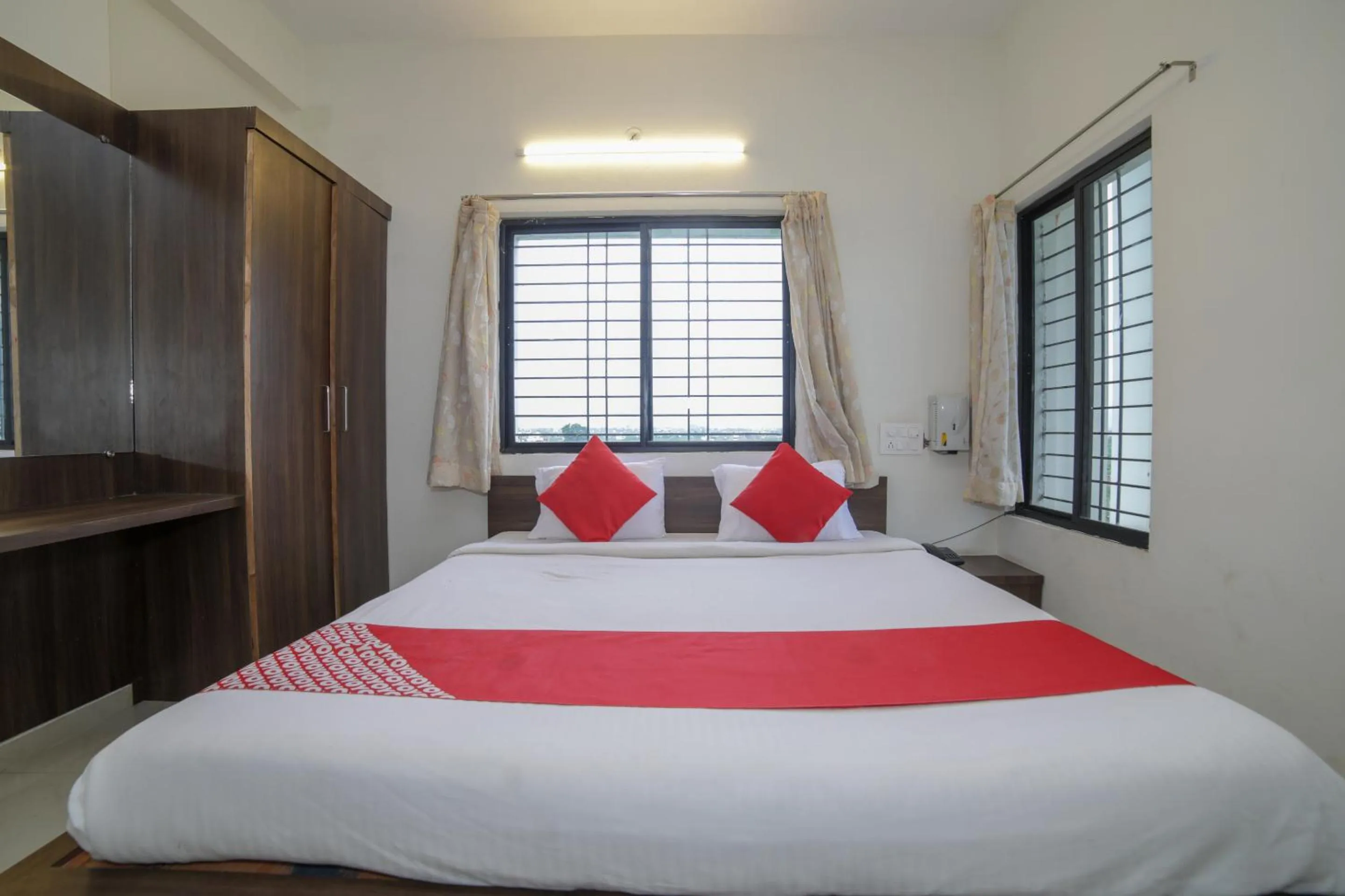 Bed in Hotel O Seva Service Apartment