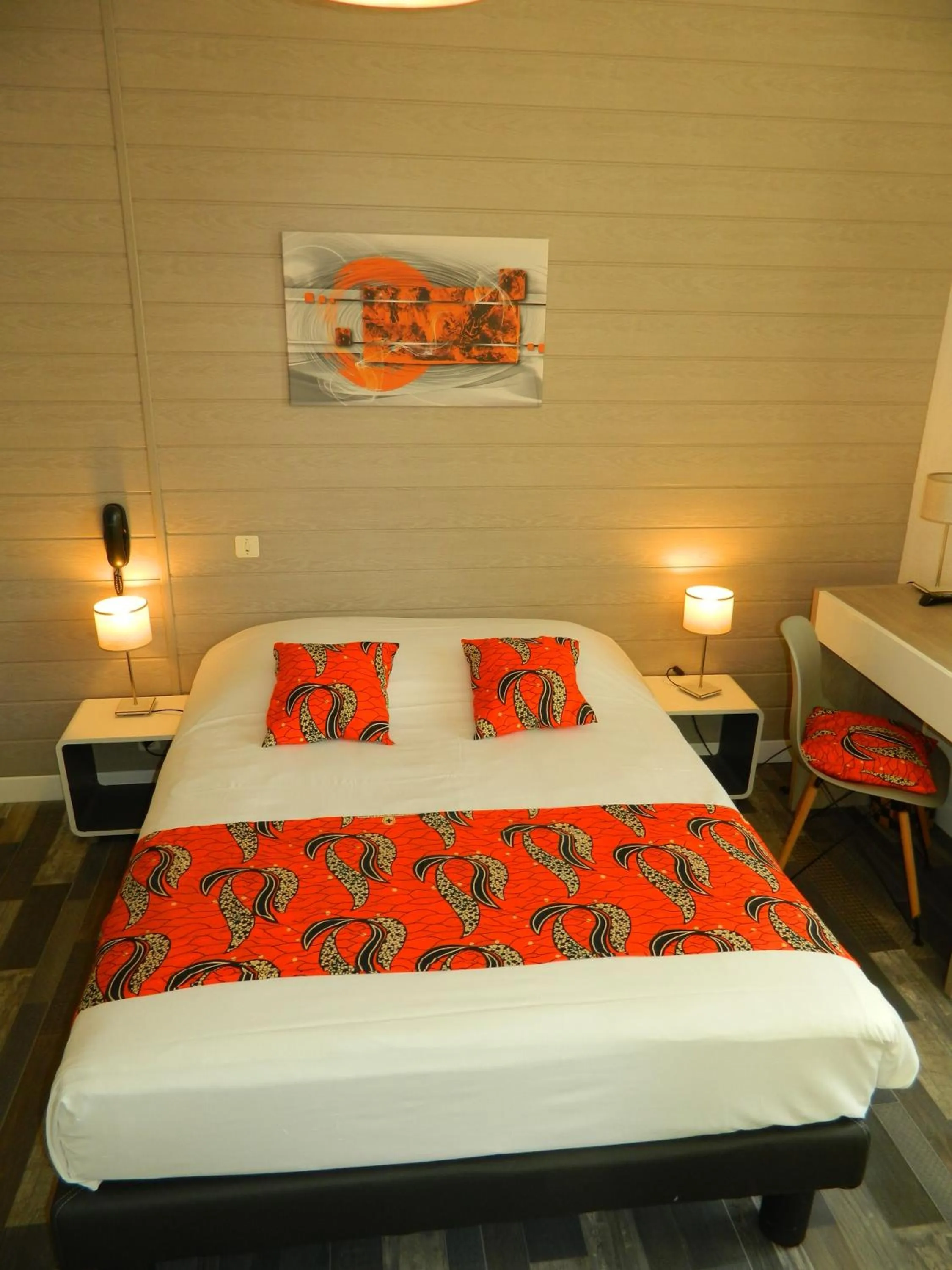 Bed in Logis Hostellerie du Neez