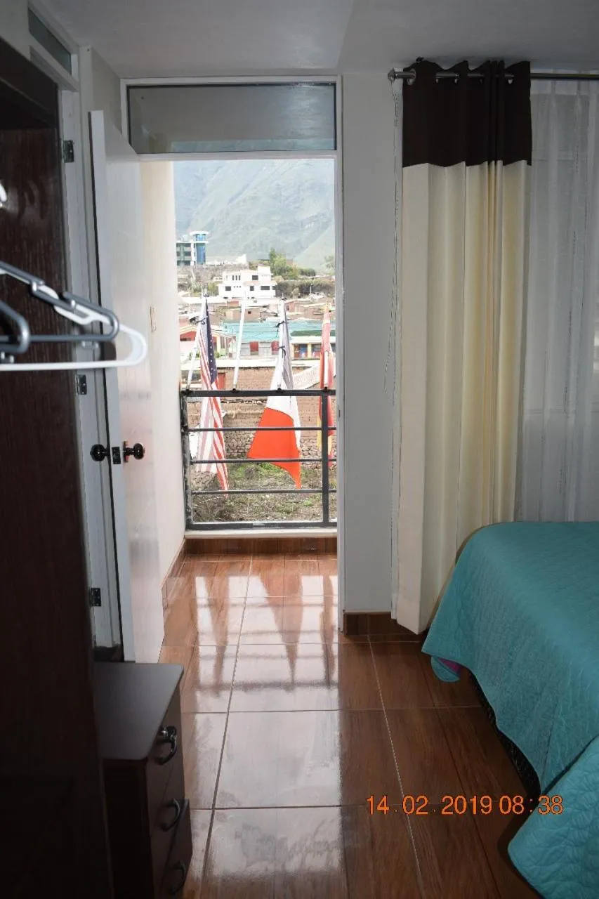 Bed in Arum Qurpawasi Hospedaje